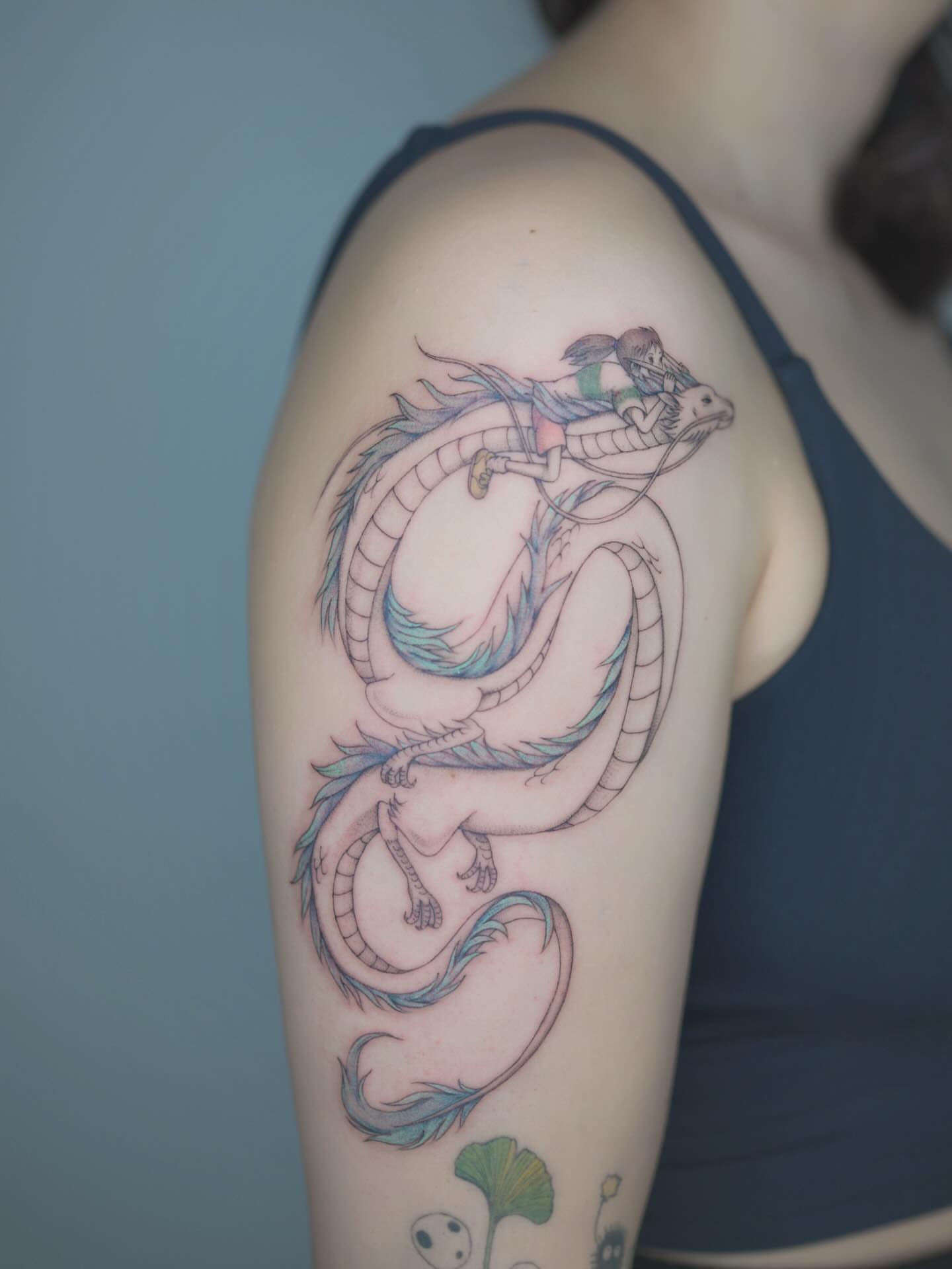 Dragon new school tattoo on the shoulder by Seattle tattoo artist-Mia
