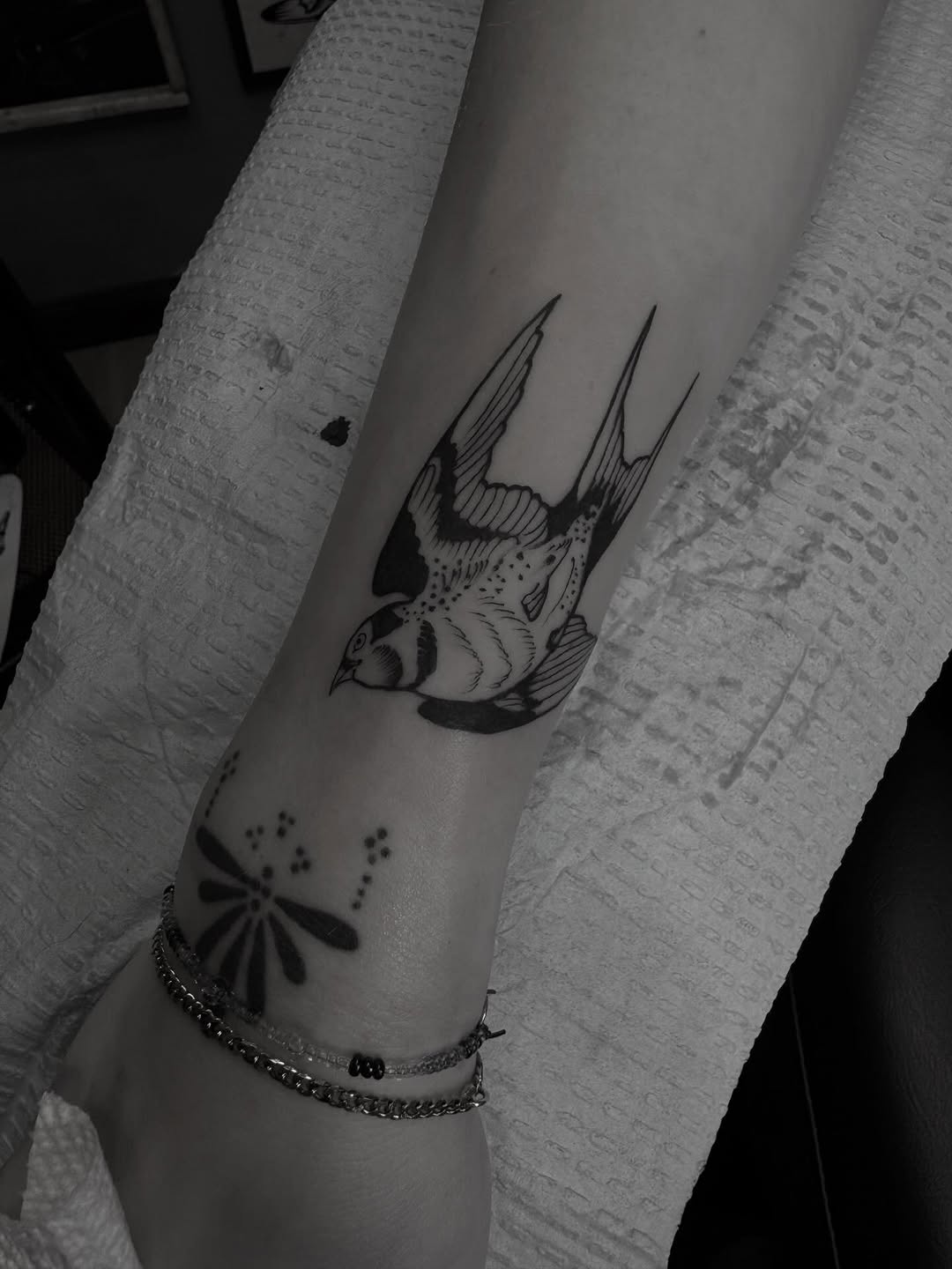 Swallow bird and dragonfly fine line tattoo on the forearm by Joe Khay, Hackettstown, New Jersey