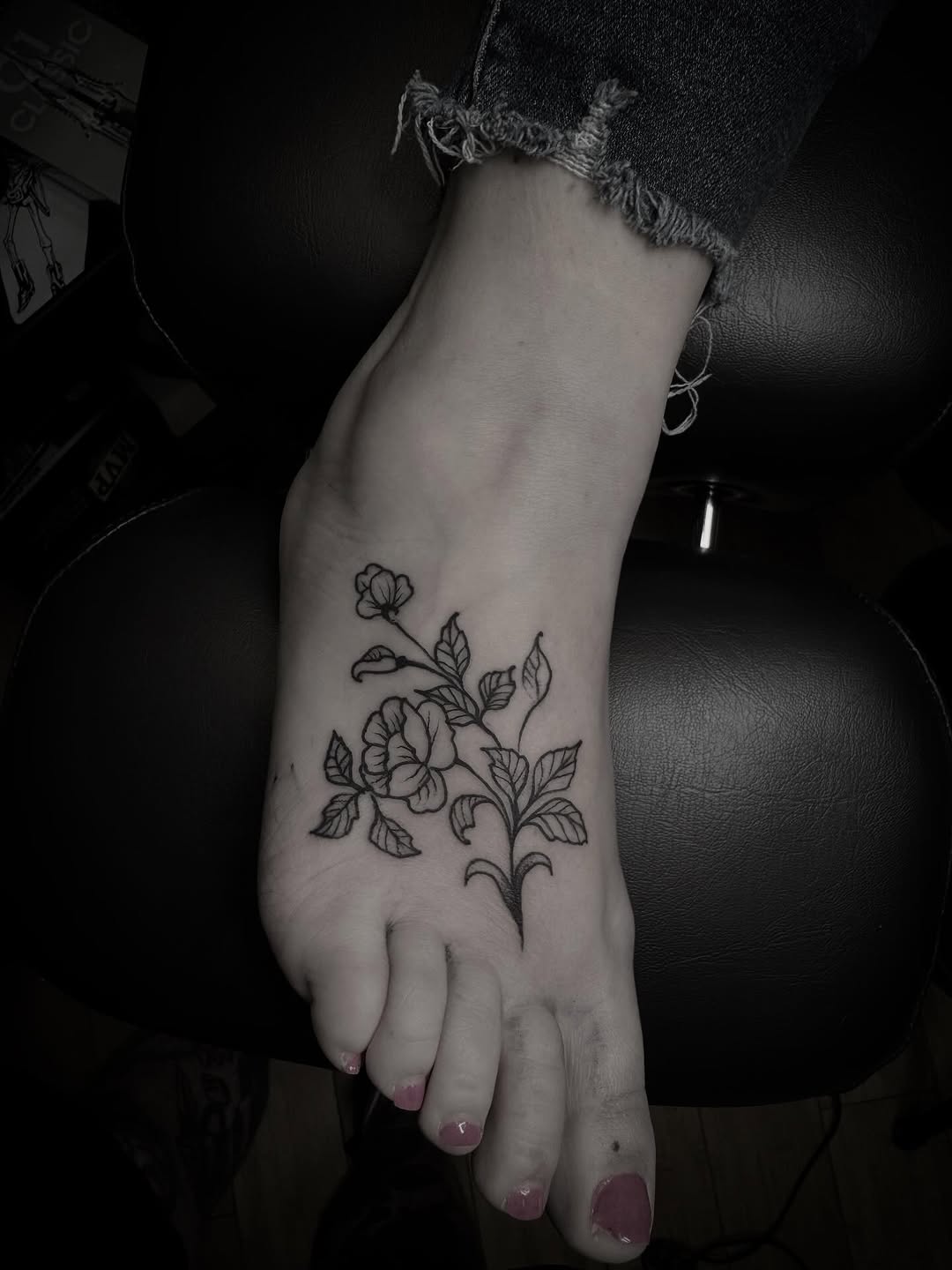 Flower branch fine line tattoo on the foot by Joe Khay, Hackettstown, New Jersey