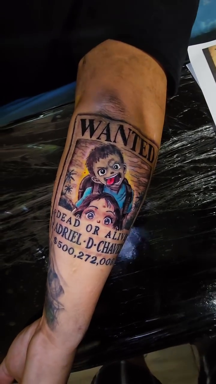 Wanted poster with cartoon characters new school tattoo by Jesse James, Las Vegas, Nevada