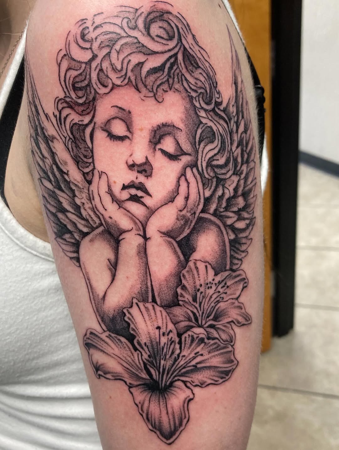 Tattoo by @tha_hot_dawg — realism, black_and_grey