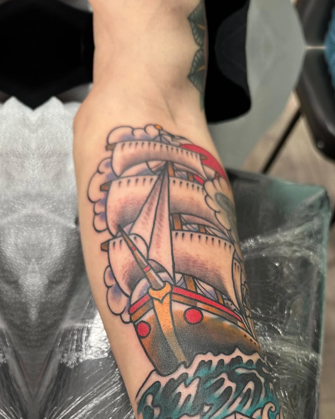 Ship on waves American traditional tattoo on the forearm by @jose.phinelynch