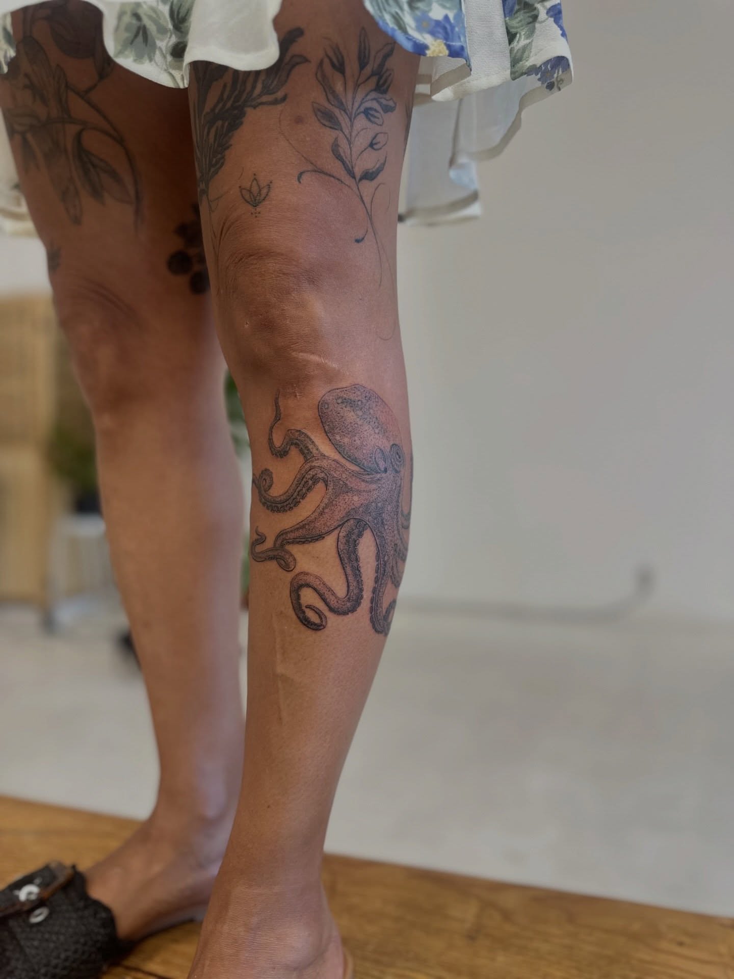 Octopus black and grey tattoo on the calf by Ric Castellon Tattoo Artist, Los Angeles, California