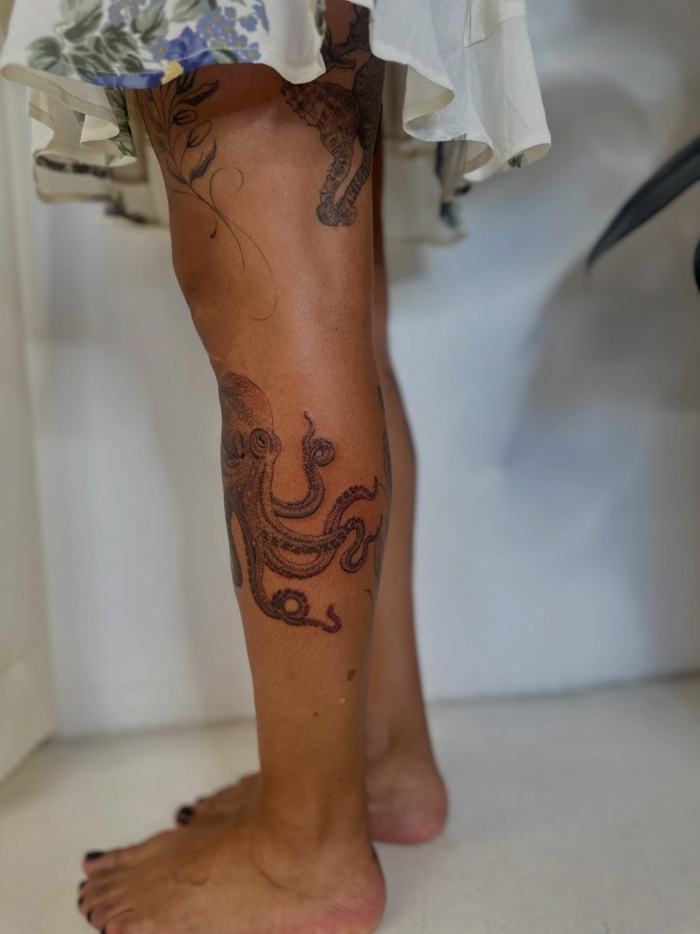 Octopus black and grey tattoo on the calf by Ric Castellon Tattoo Artist, Los Angeles, California