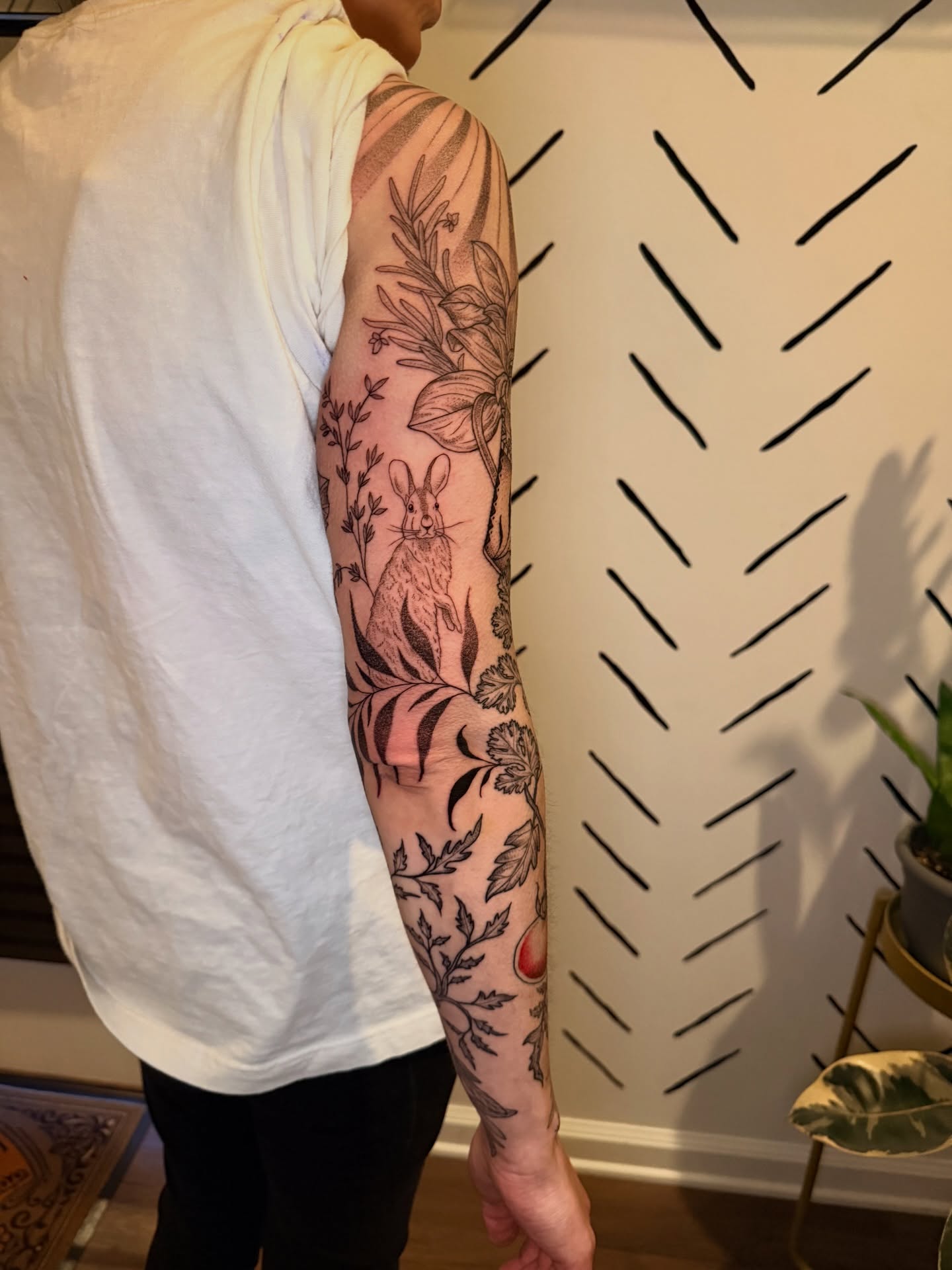 Rabbit and floral black and grey tattoo on the forearm by ππ£ππ€π₯π ππ¦ππ‘π, Lakewood, Colorado