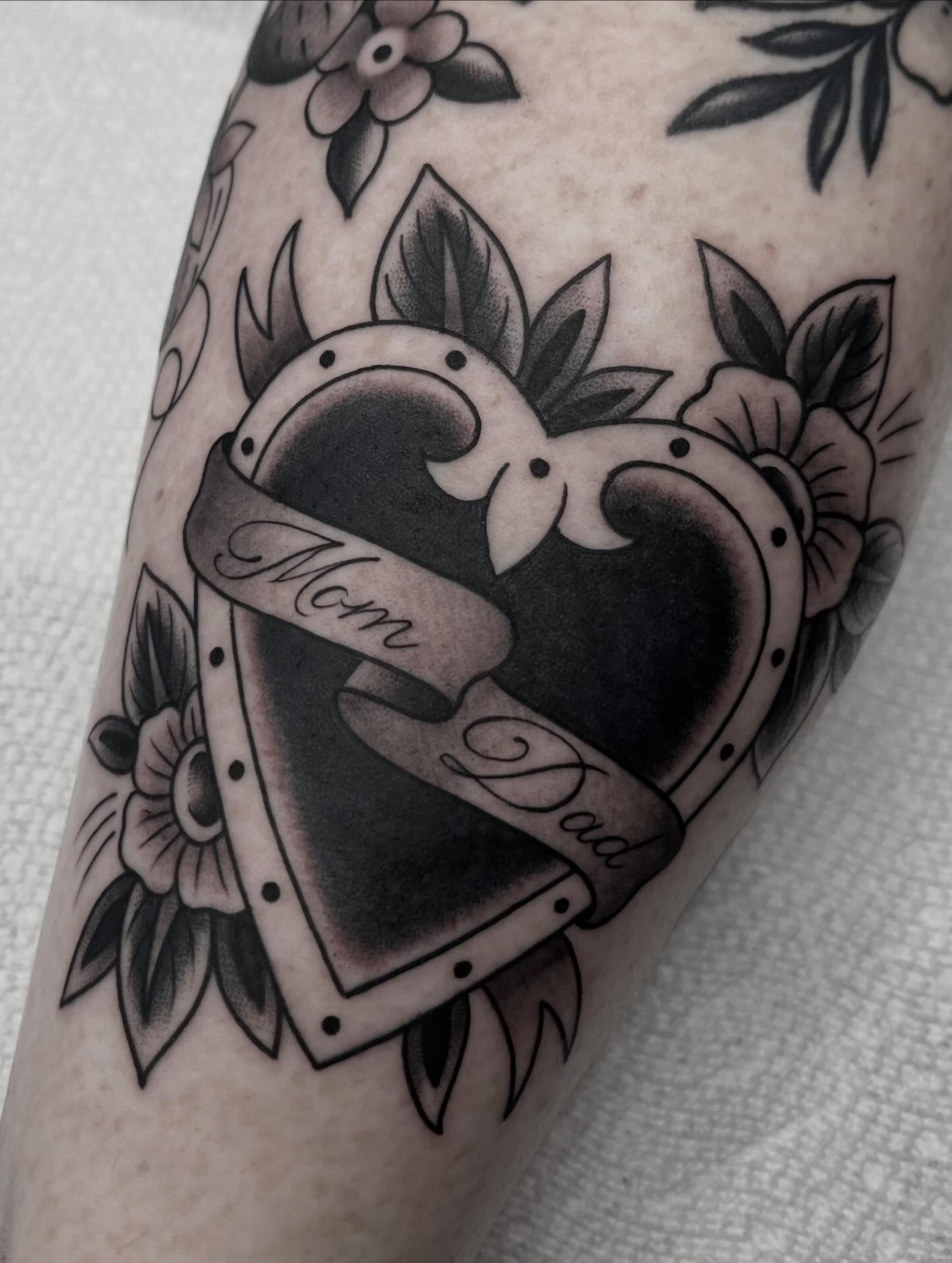 Heart with ribbon American traditional tattoo on the forearm by Kayla Faircloth, Charlotte, North Carolina