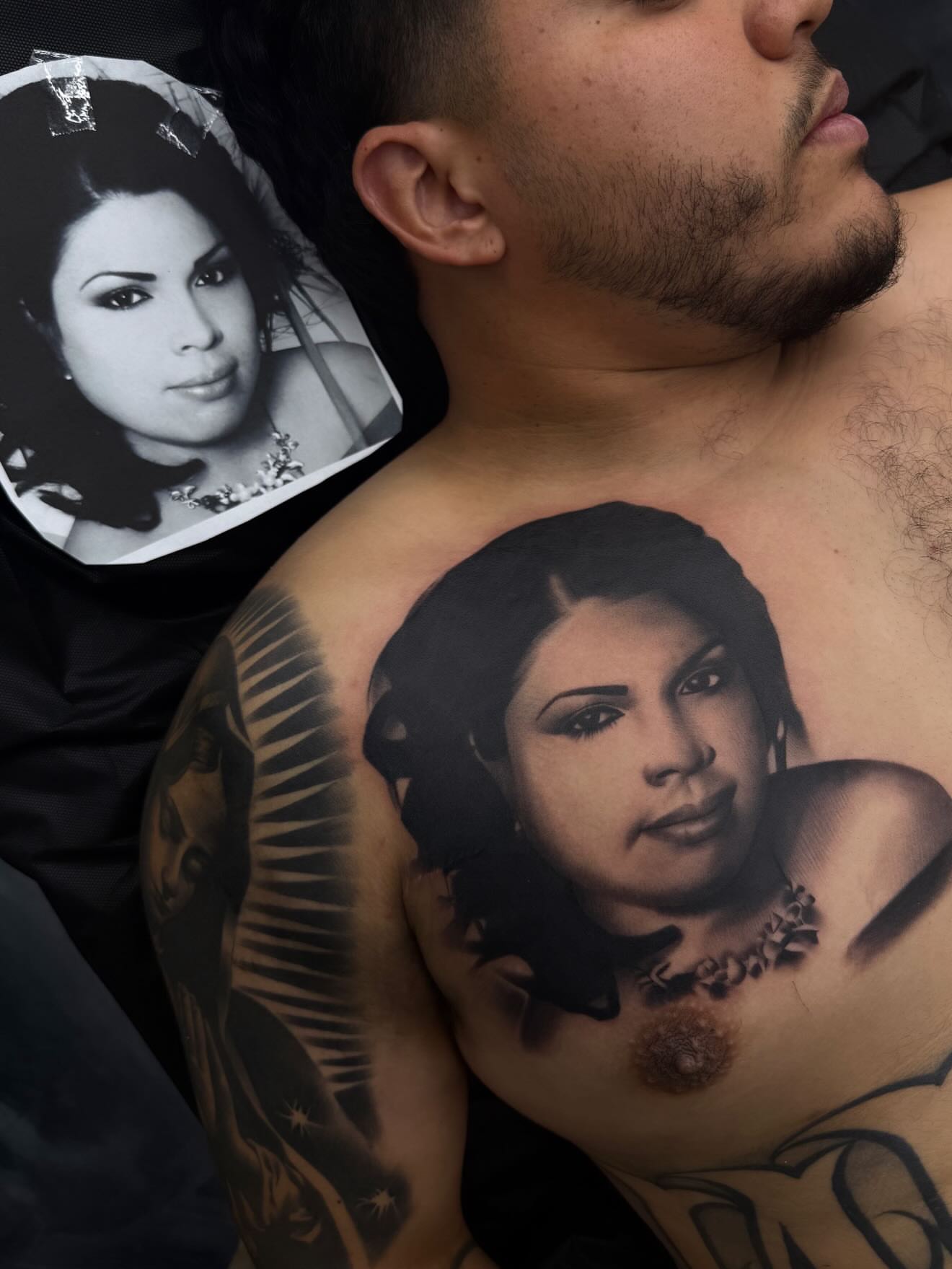 Portrait realism tattoo on the chest by TattooBoyTattoos