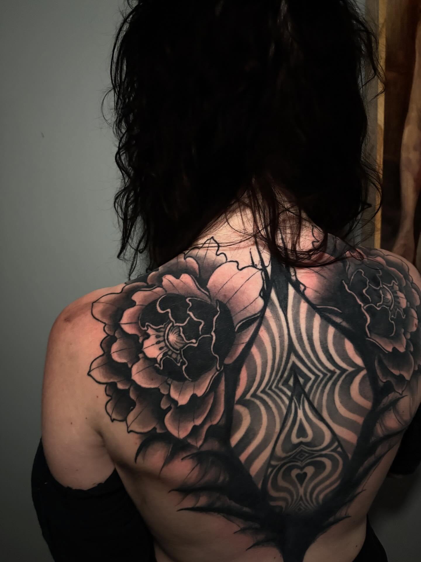 Peony black and grey tattoo on the back by Cameron Scofield