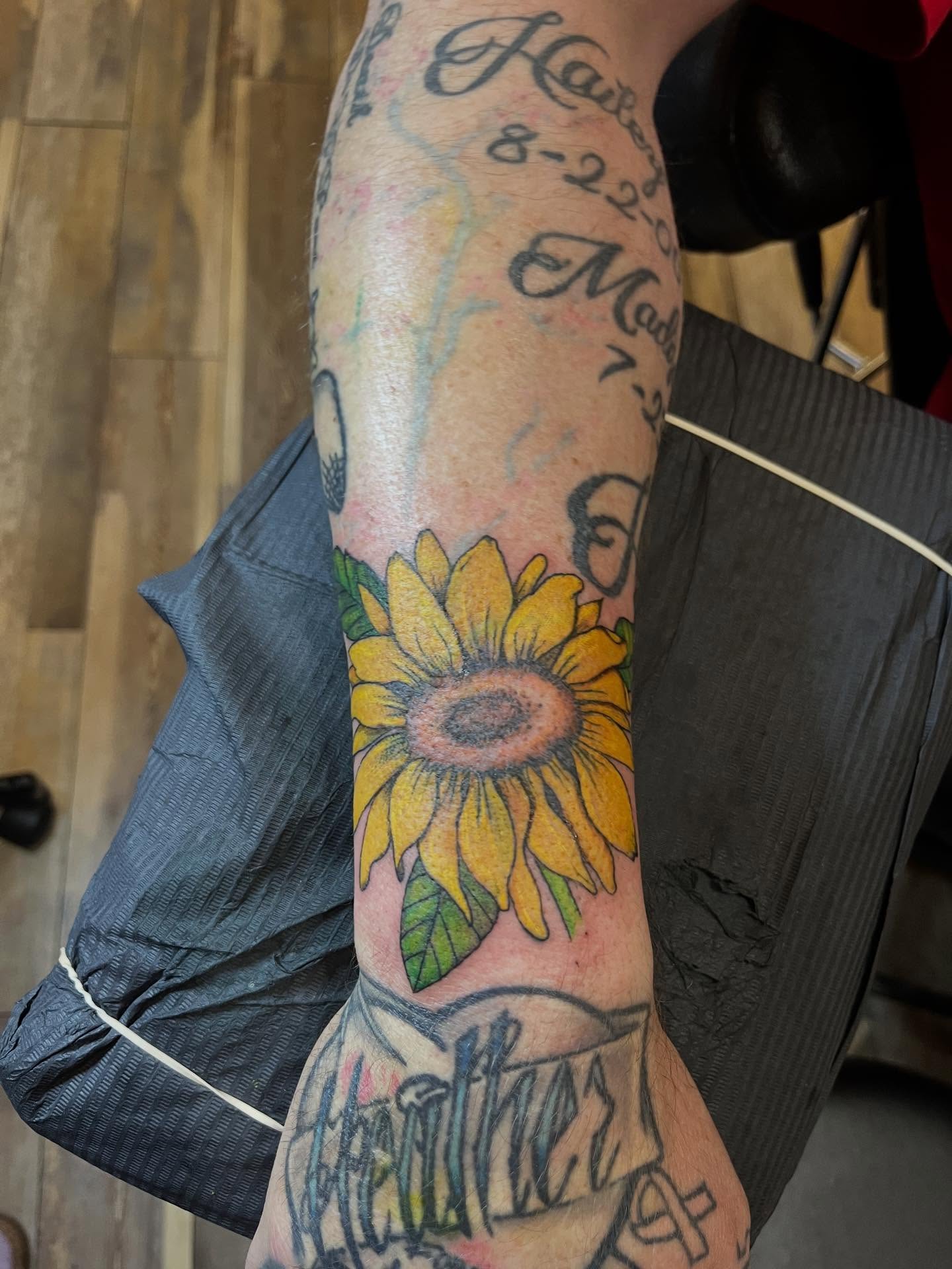 Sunflower American traditional tattoo on the forearm by Tattoo Artist, Kansas City, Missouri