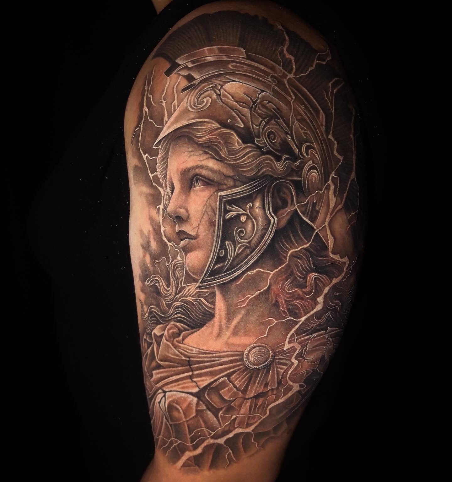 Female warrior realism tattoo on the forearm by Jon Gioia