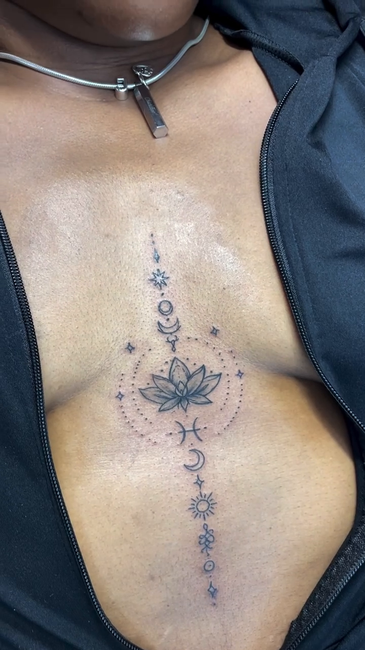Ornamental tattoo on the chest by Inkman Parson