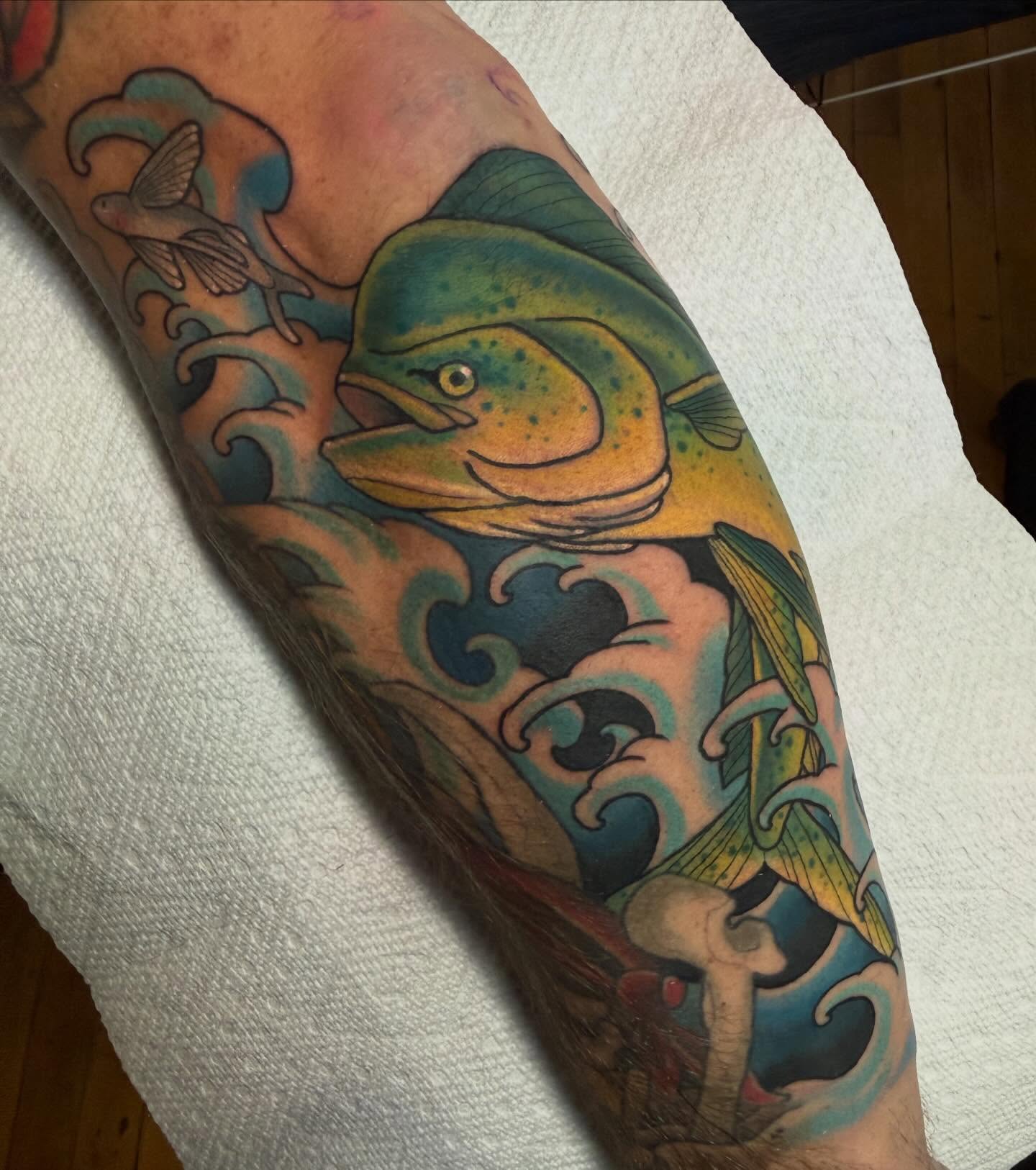 Salmon American traditional tattoo on the forearm by Kyle Behr