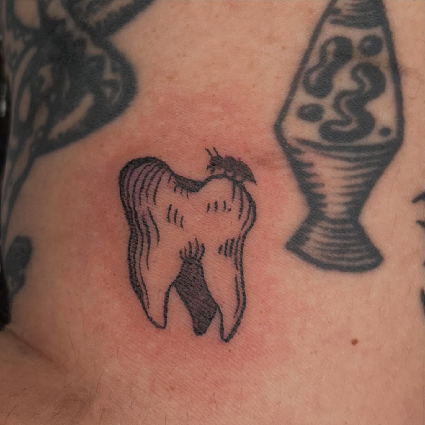 Tooth black and grey tattoo on the chest by ⁎⁺˳✧༚Emma