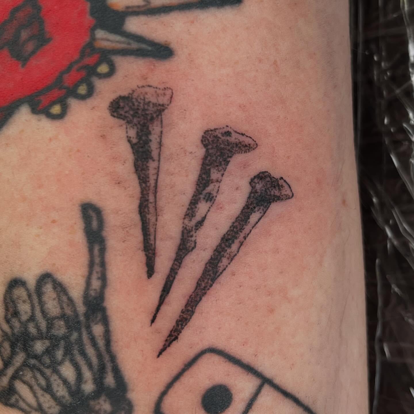 Nails black and grey tattoo on the forearm by ⁎⁺˳✧༚Emma