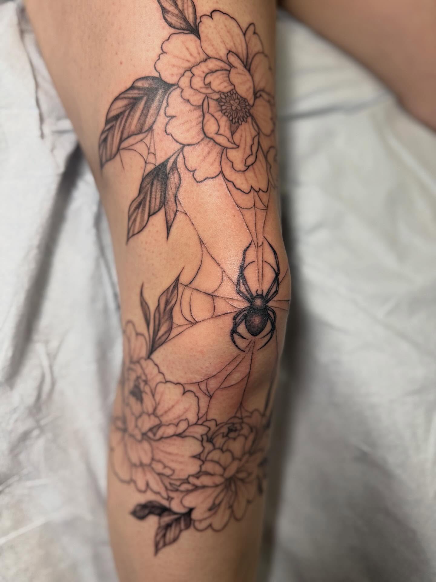 Peony and spider black and grey tattoo on the forearm by Camryn Justice