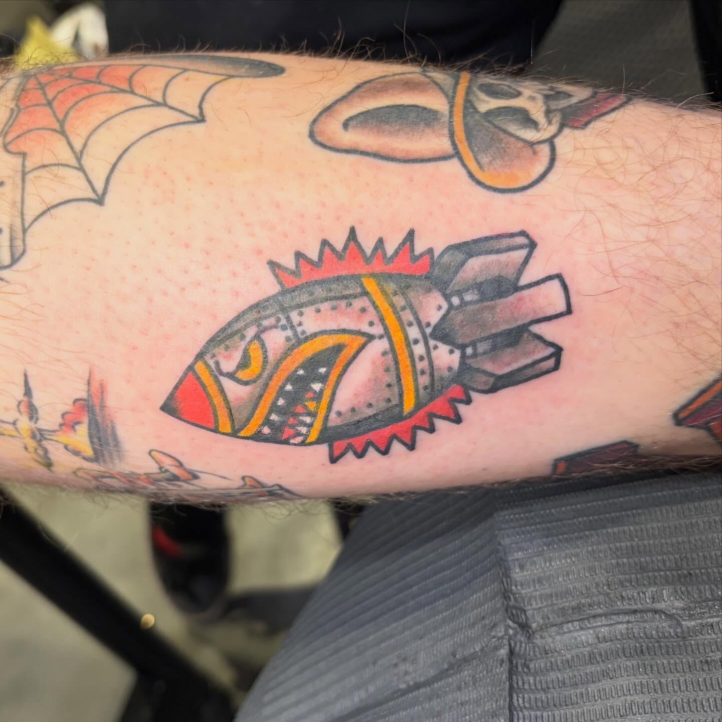 Robotic fish American traditional tattoo on the forearm by Scrap Iron Tattoos
