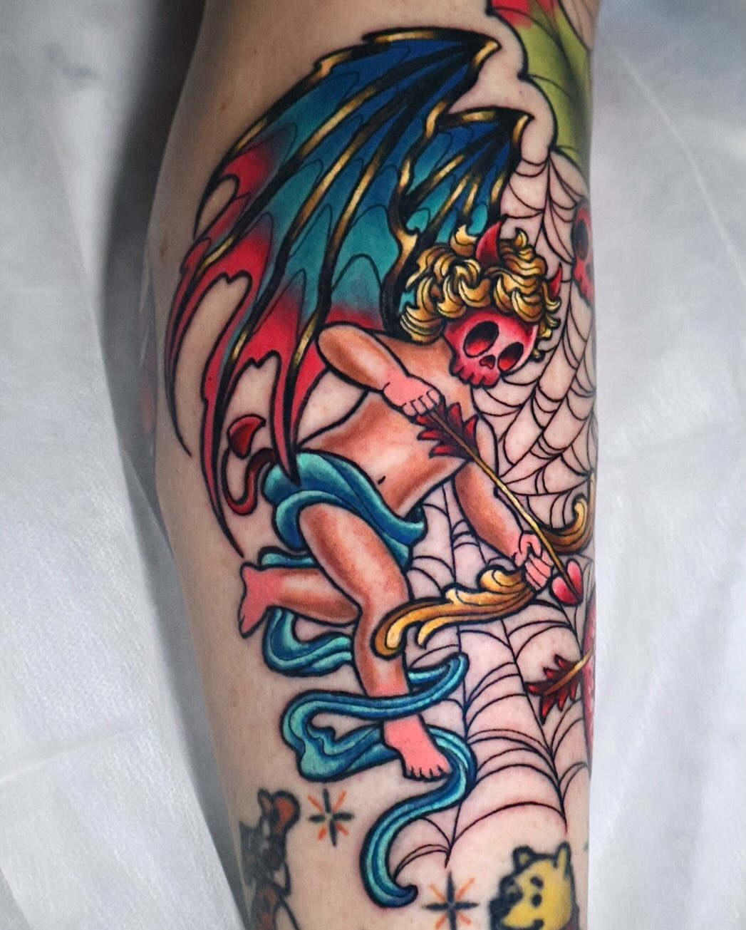 Cherub with wings American traditional tattoo on the forearm by Bailey Drey