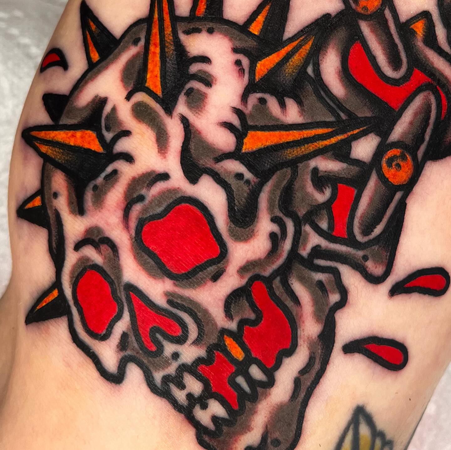 Skull American traditional tattoo on the forearm by Sky G, Colorado Springs, Colorado