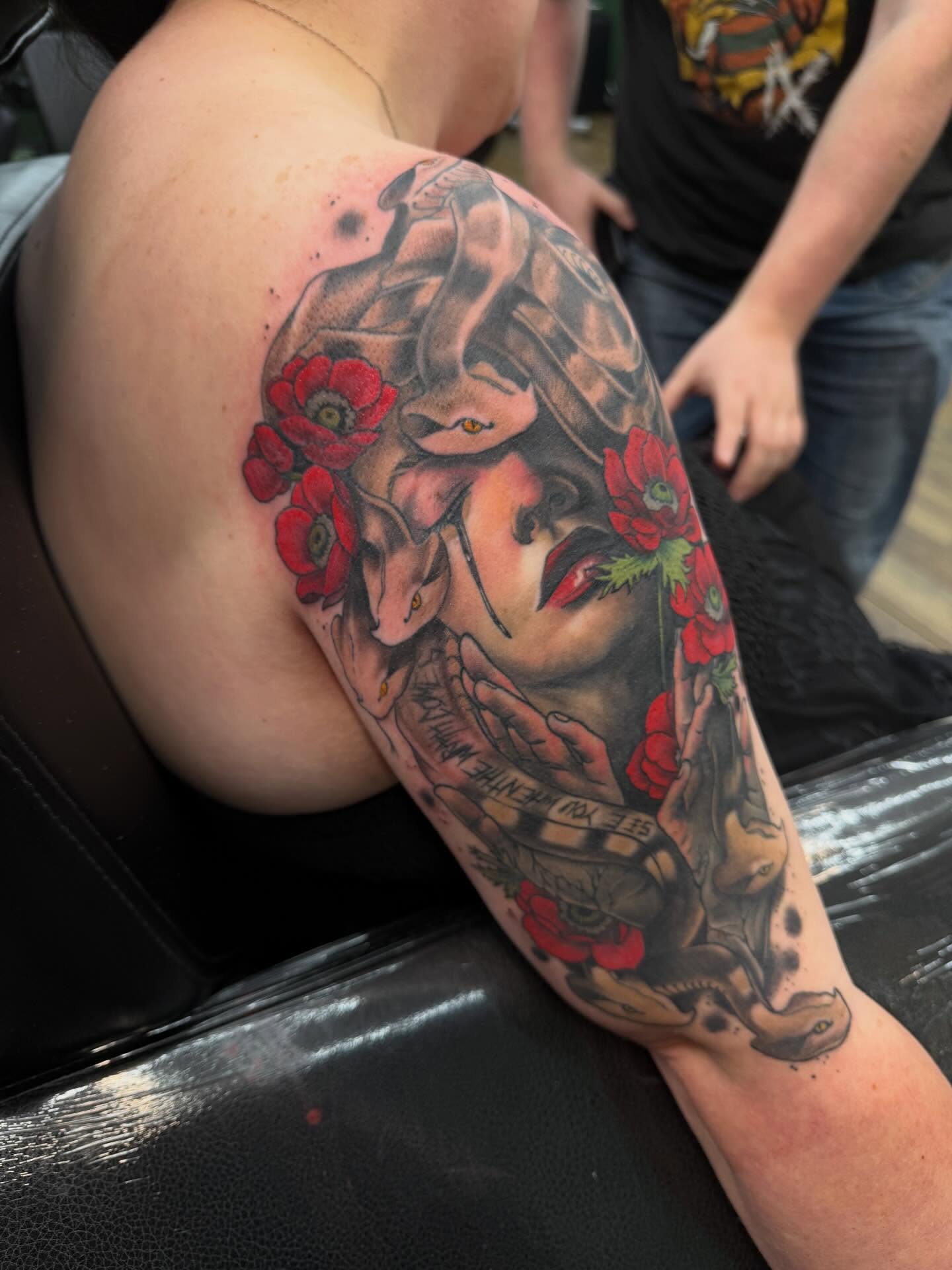 Woman with snake and flowers American traditional tattoo on the shoulder by ✥ Daemon Downing ✥ Kansas Tattoo Artist ✥, Wichita, Kansas