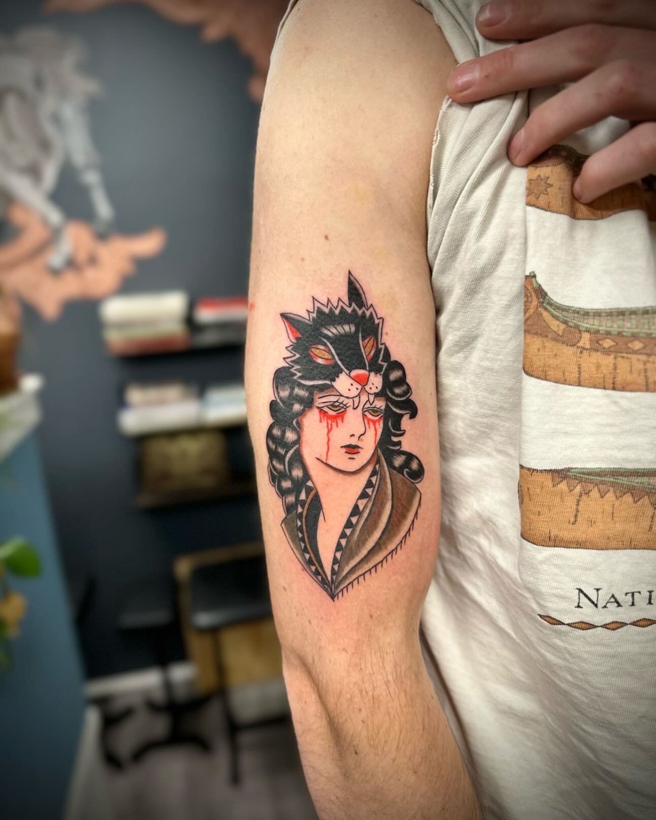 Woman with cat ears American traditional tattoo on the forearm by rory