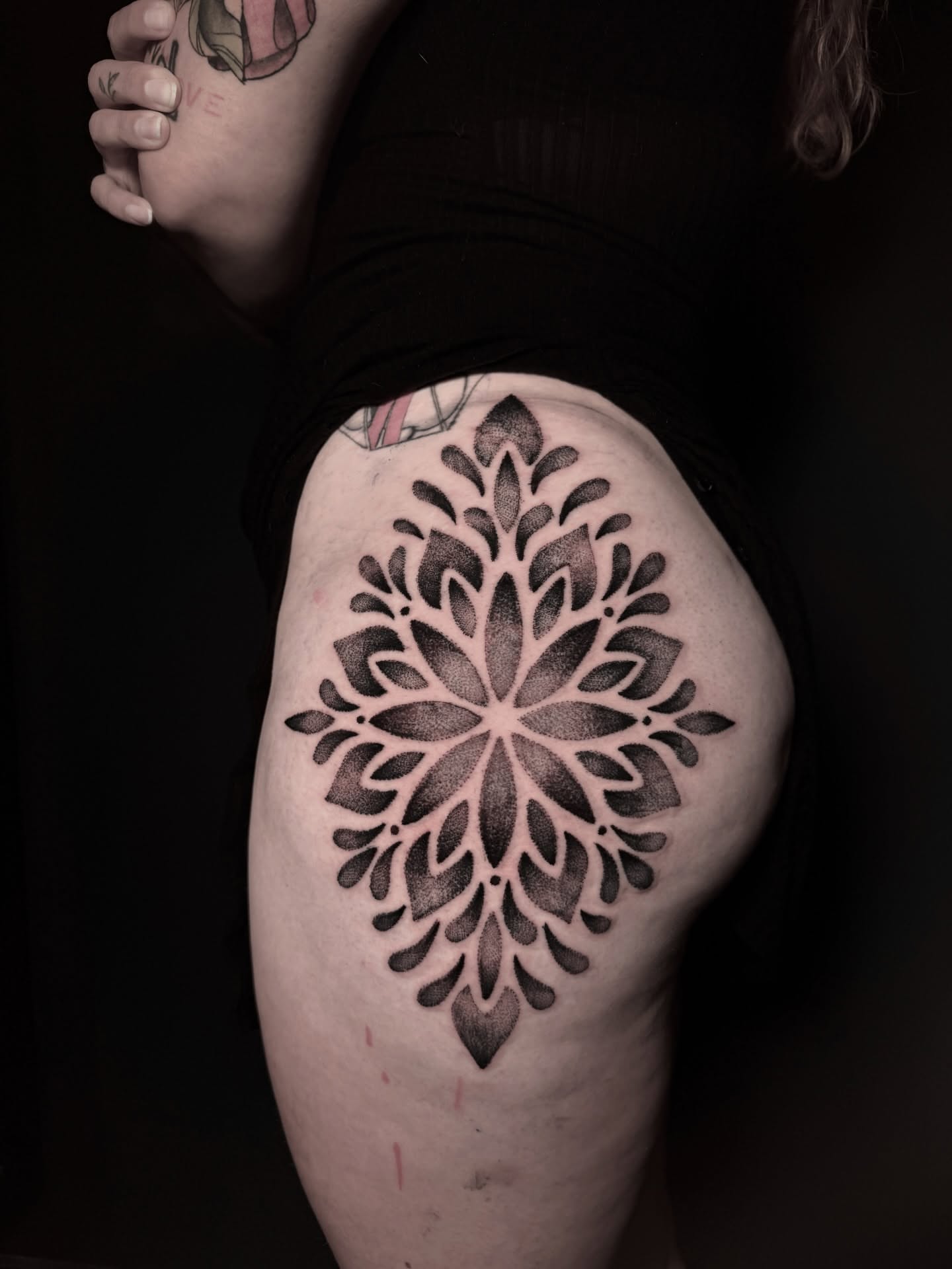 Geometric pattern geometric tattoo on the thigh by Alex Cantor