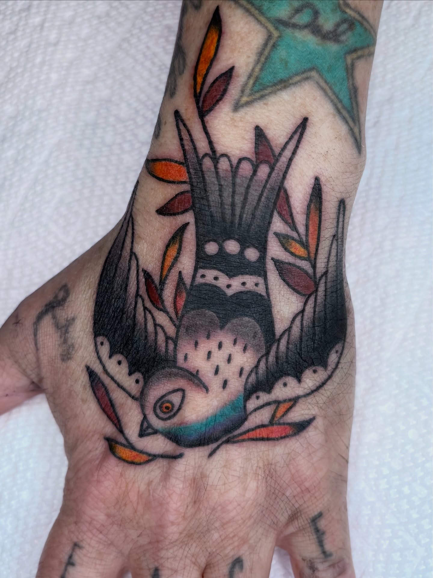 Bird American traditional tattoo on the hand by ★ ★ ★ Matt Reinstone ★ ★ ★