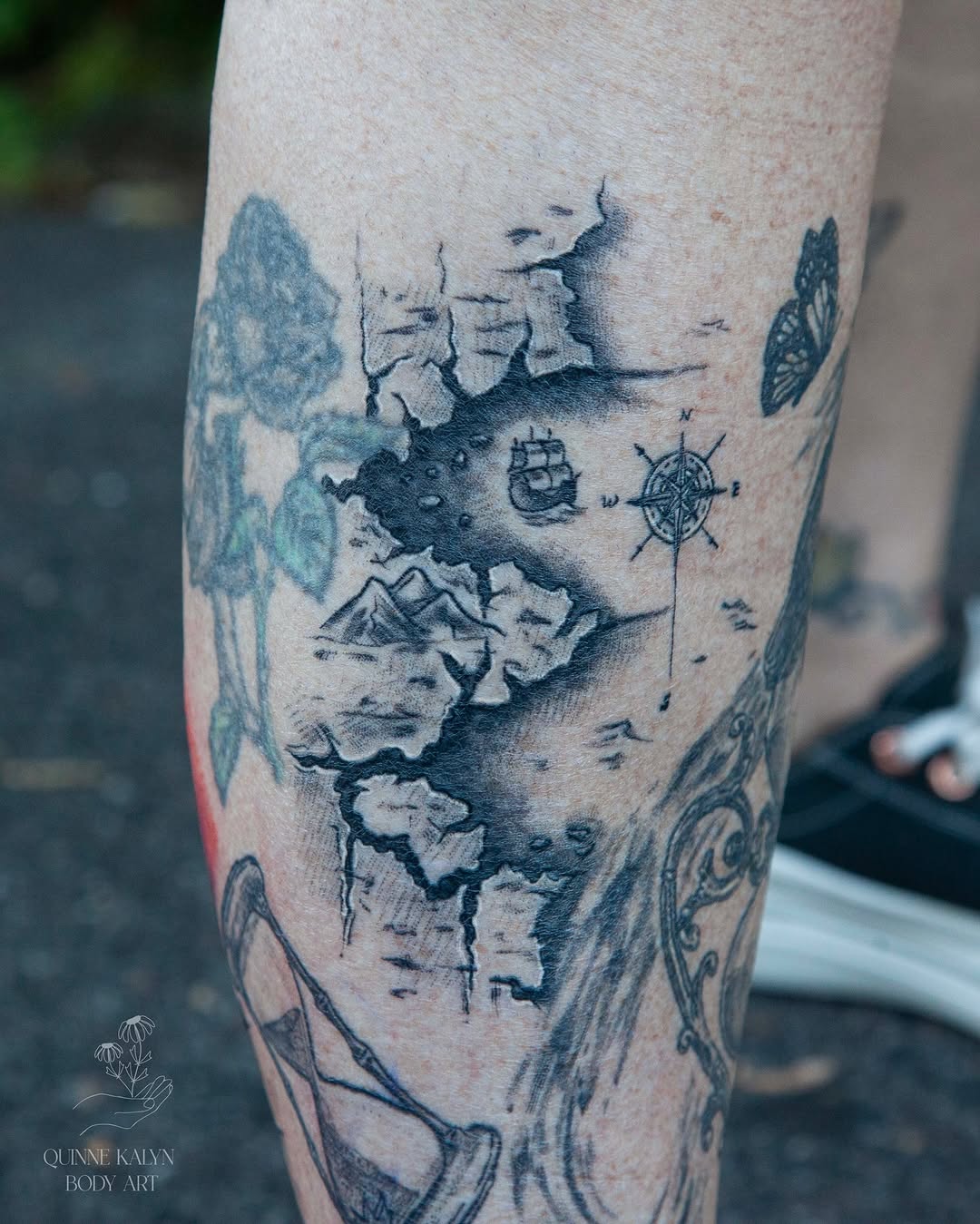Tattoo by @quinnekalynbodyart — black_and_grey, realism