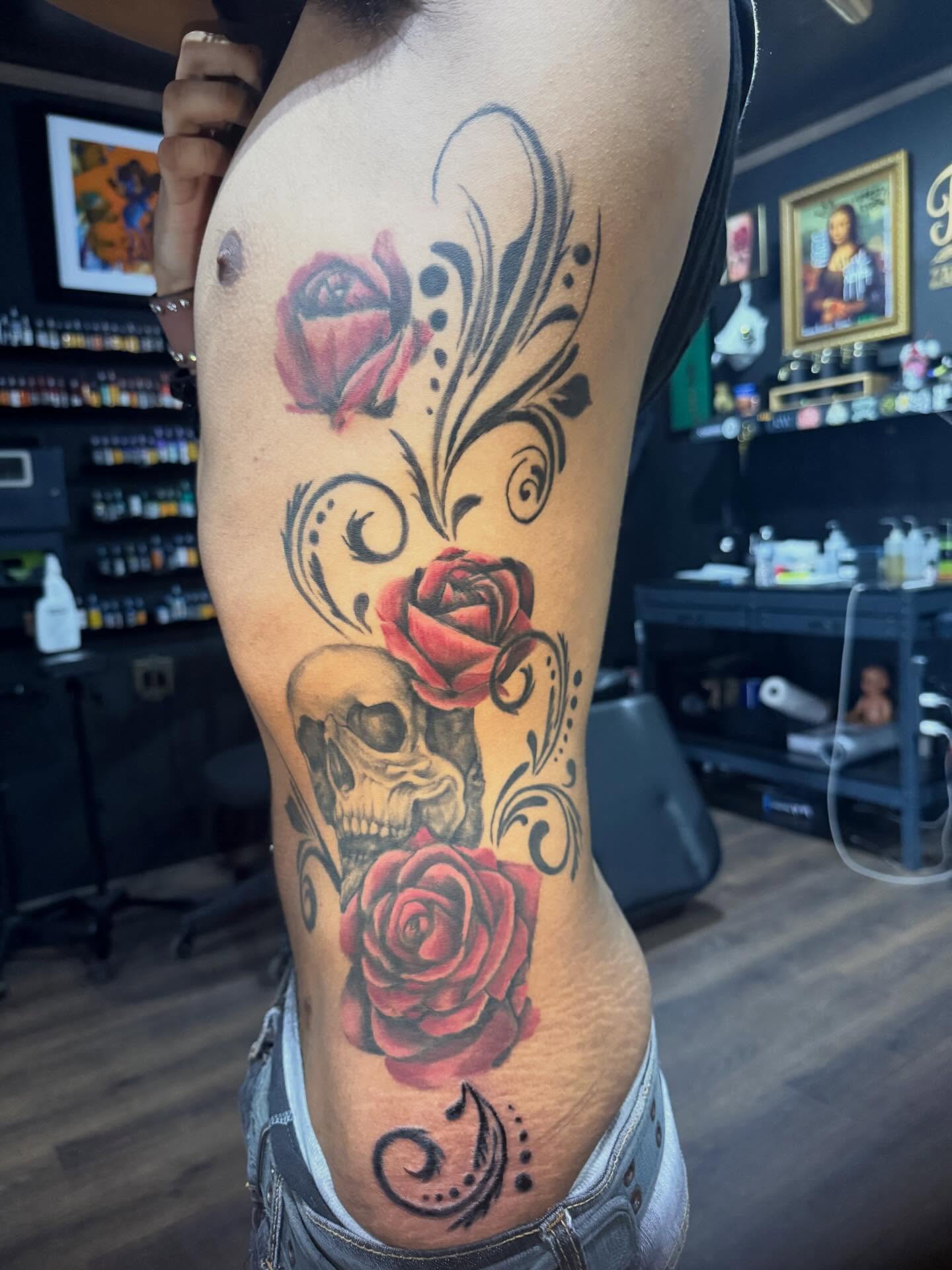 Roses and skull Chicano tattoo on the thigh by Teara faith krigbaum