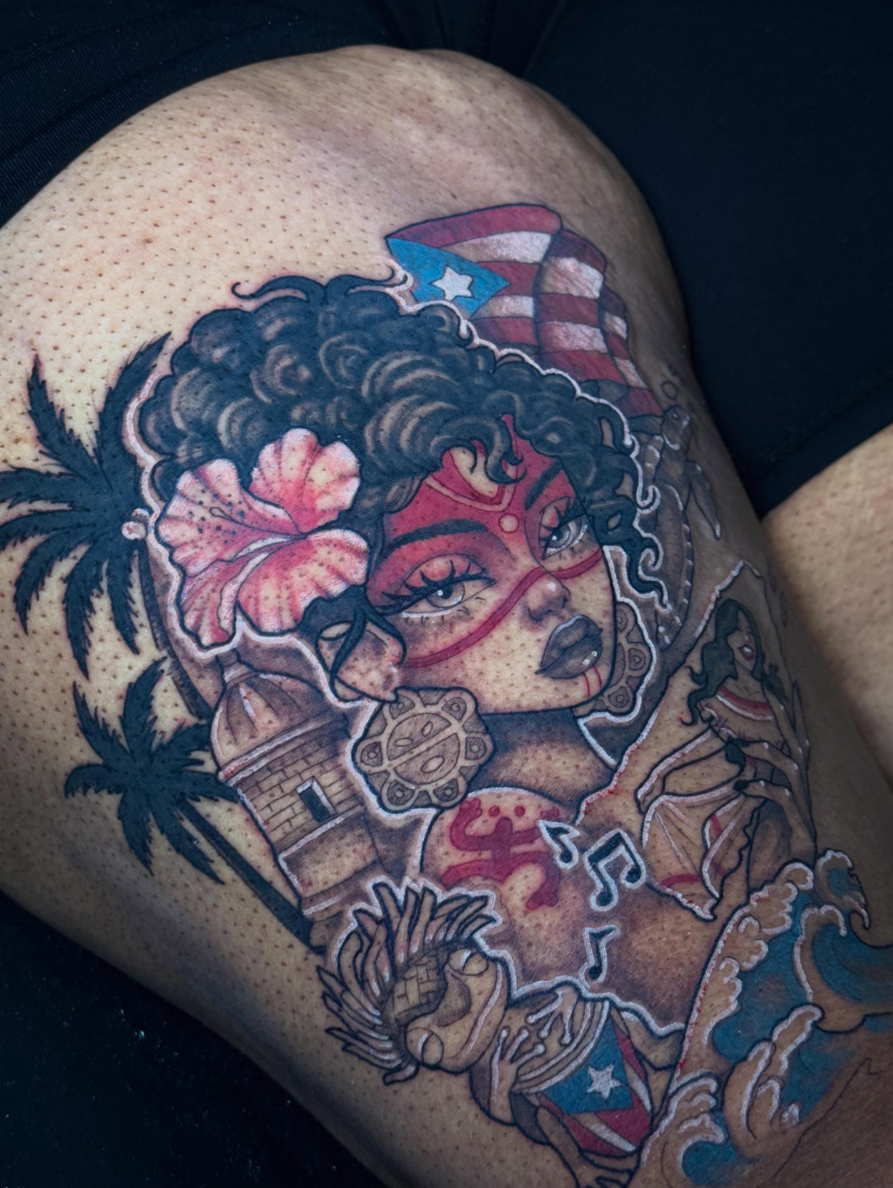 Puerto Rican woman American traditional tattoo on the thigh by Andreanna Rosemarie Gabranidis, Pennsauken, New Jersey
