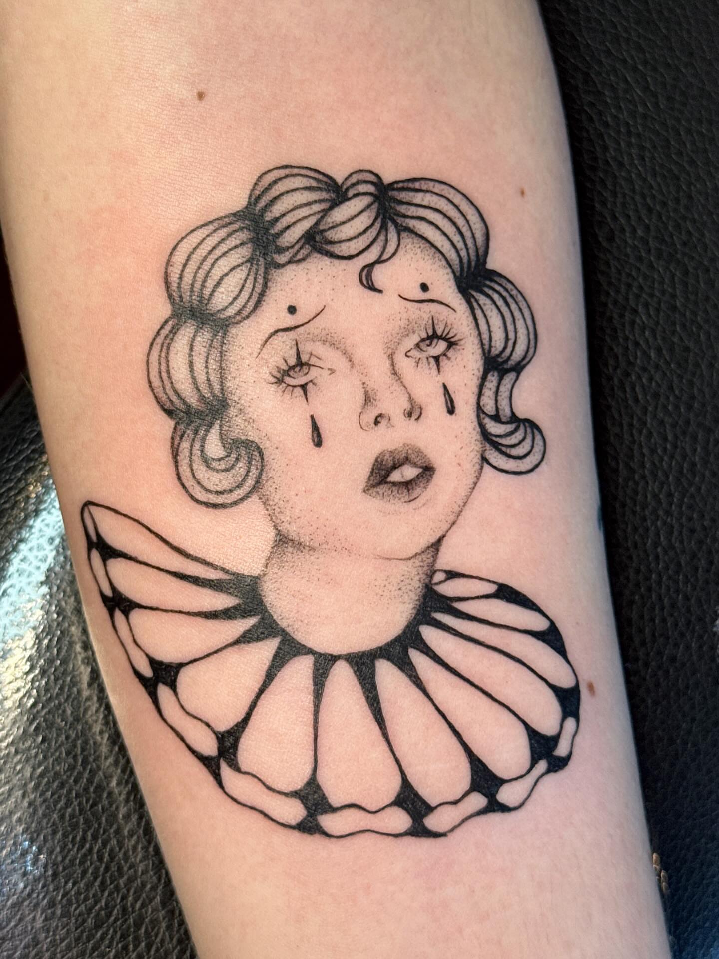 Clown black and grey tattoo on the forearm by tattoos by miss jackie o 🎱