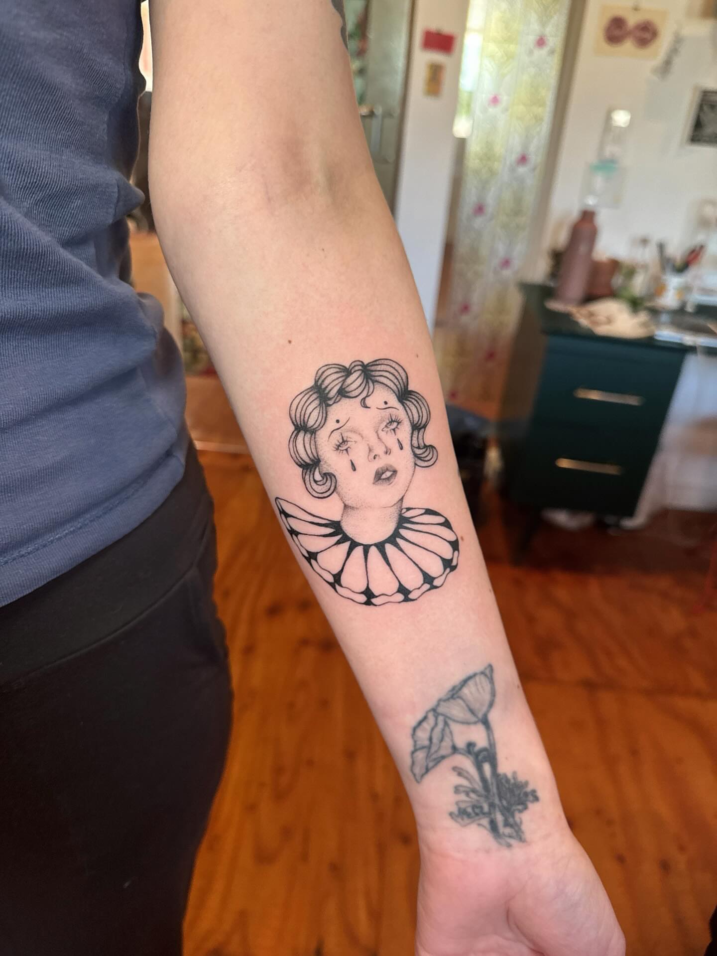 Clown black and grey tattoo on the forearm by tattoos by miss jackie o 🎱