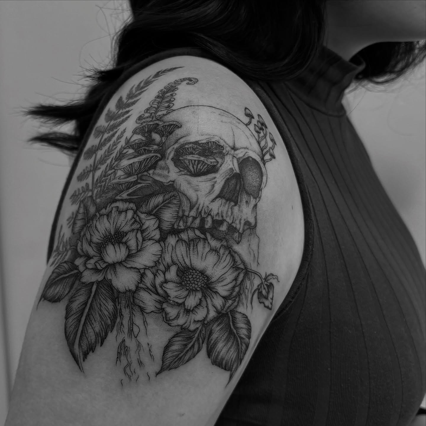 Skull and flowers realism tattoo on the shoulder by Tayler, Tooele, Utah