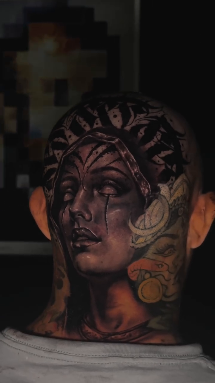 Woman's portrait with ornate headwear realism tattoo by Bailey Hancock