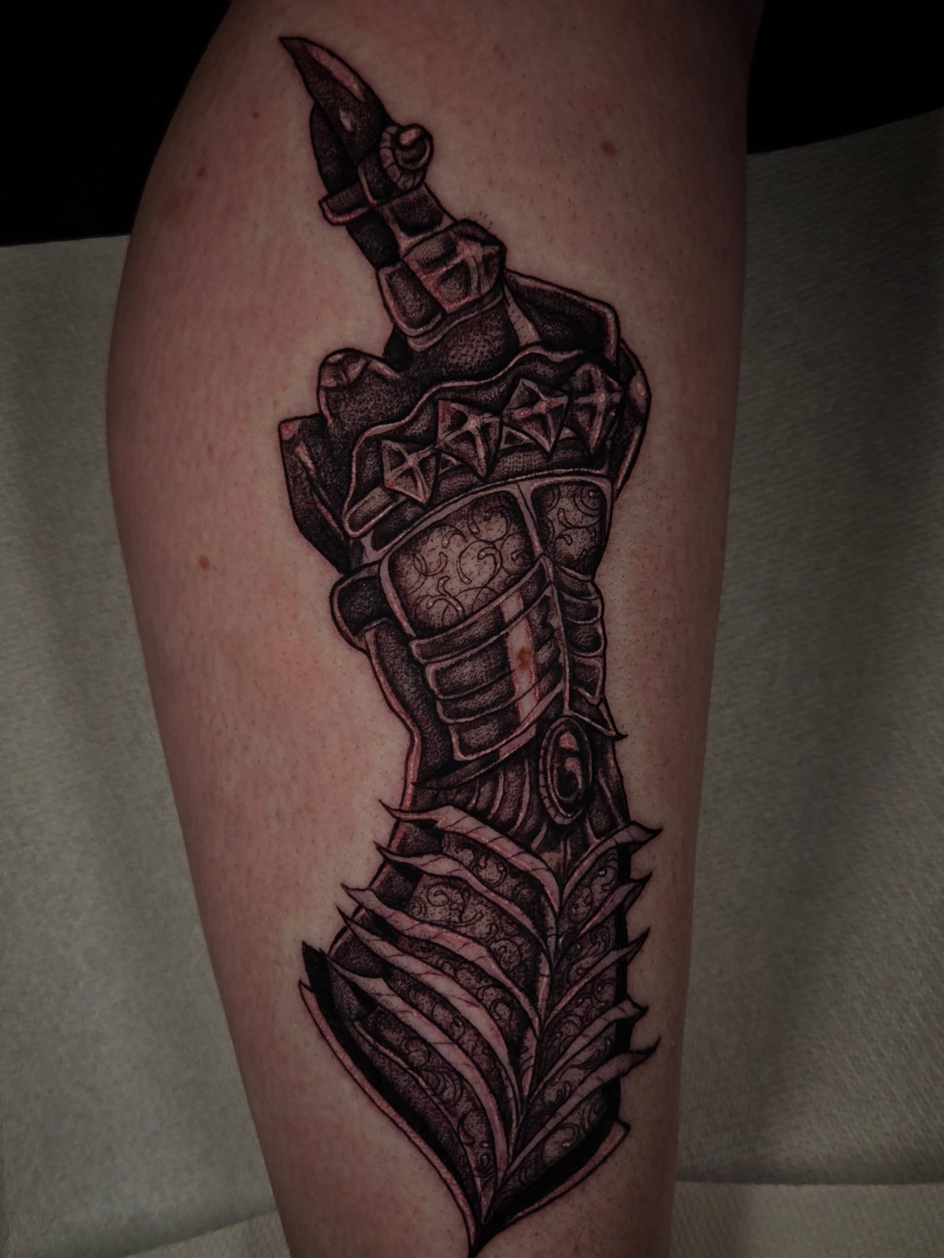 Sword black and grey tattoo on the forearm by Devin 🖤
