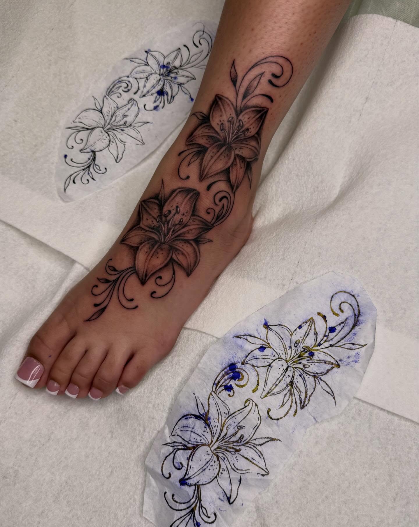Lily black and grey tattoo on the foot by Nadia ★