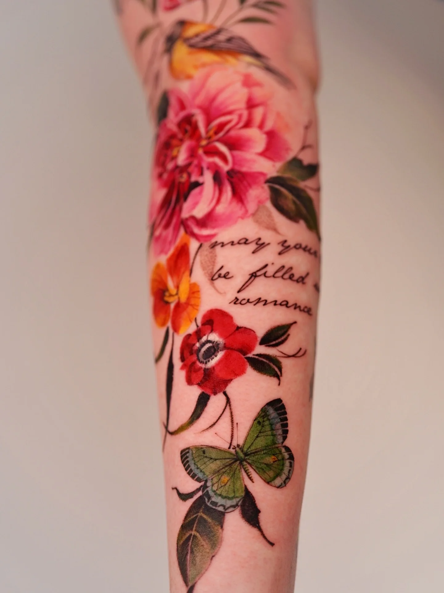 Romance realism tattoo on the forearm by Vii