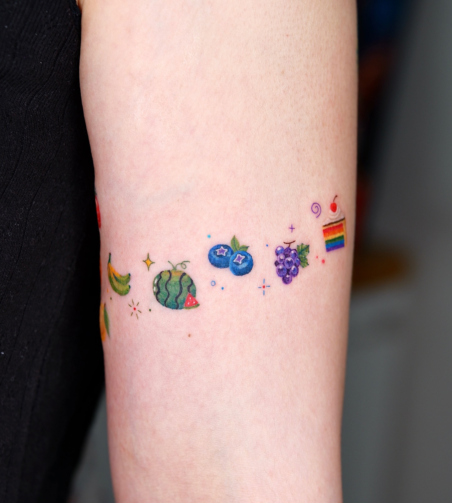 Fruits and symbols dotwork tattoo on the forearm by 타투 Seon 컬러타투