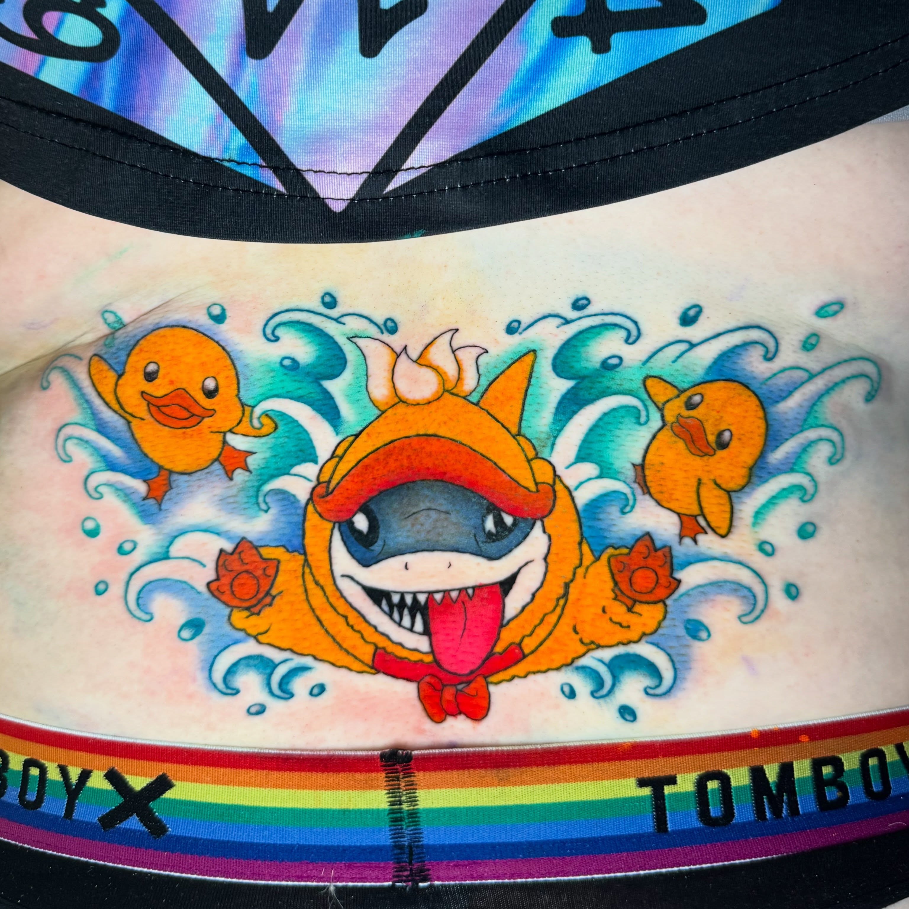Shark in raincoat new school tattoo on the torso by 🍄Annie Burkhard🍄, Indianapolis, Indiana
