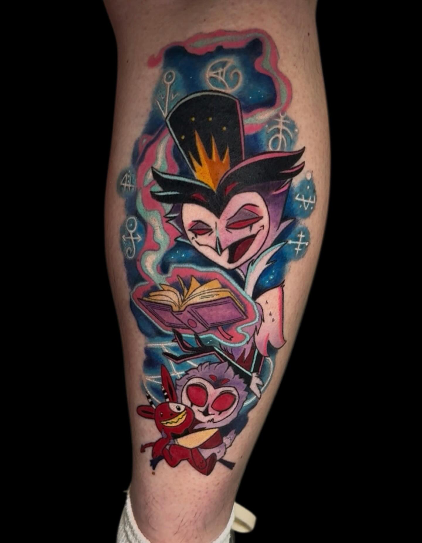 Malevolent character reading book American traditional tattoo on the forearm by Amanda Lineweaver