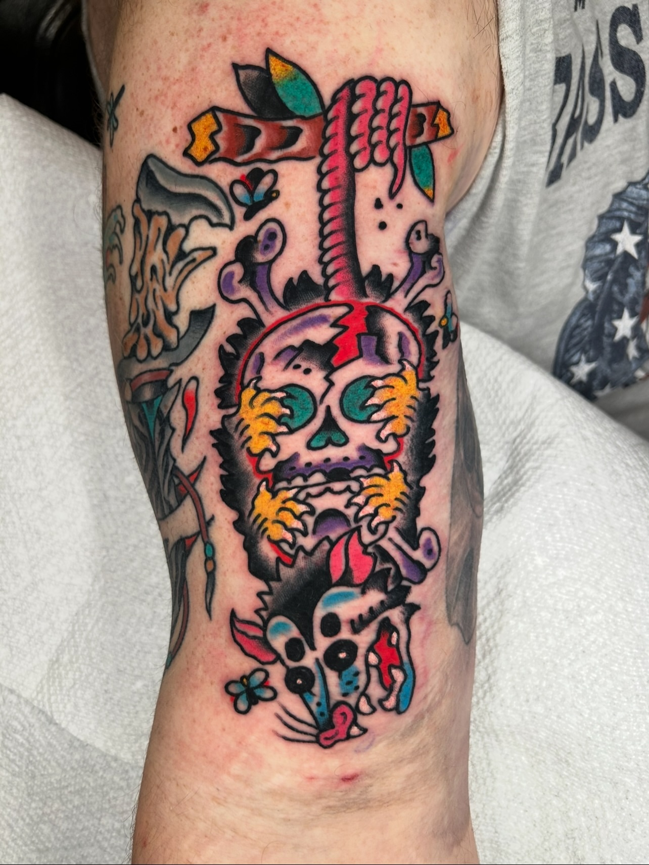 Skull and cat American traditional tattoo on the forearm by Kit Miller, Indianapolis, Indiana