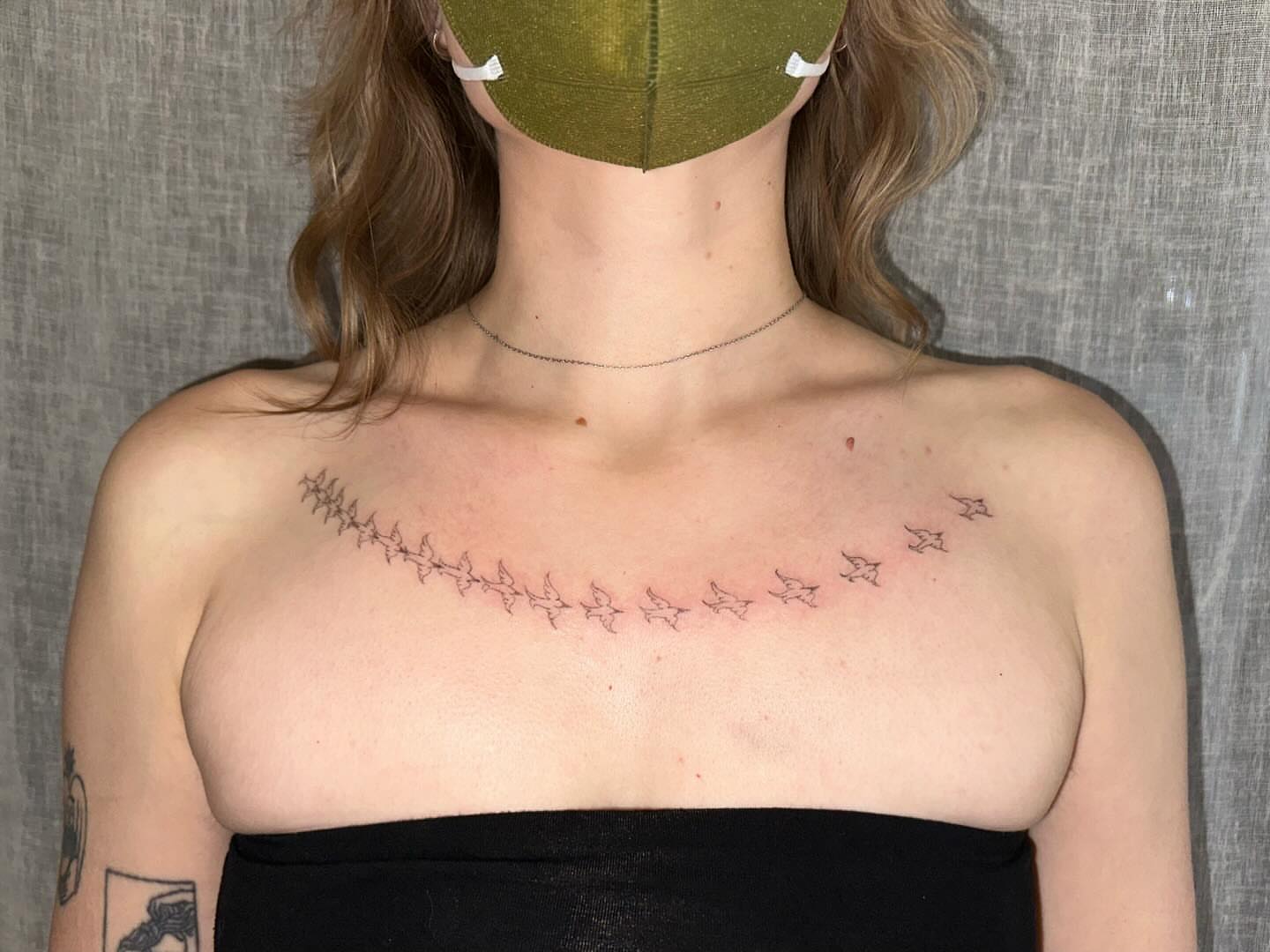 Birds in flight fine line tattoo on the chest by kate