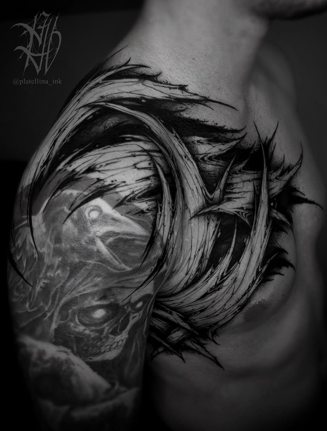 Skull and abstract elements tattoo on the shoulder by Dark Gothic Tattoo
