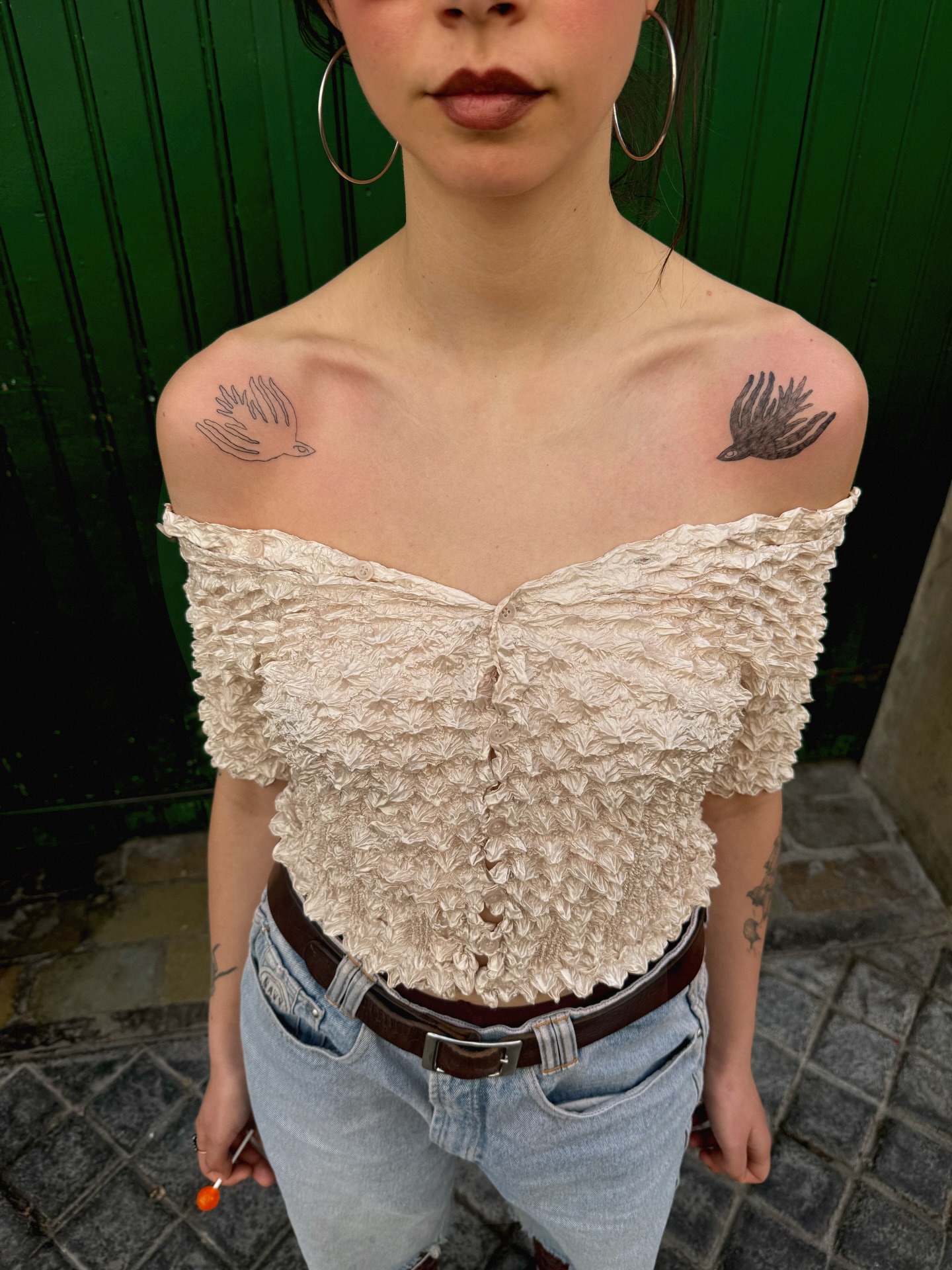 Bird black and grey tattoo on the shoulder by Eden Kalif