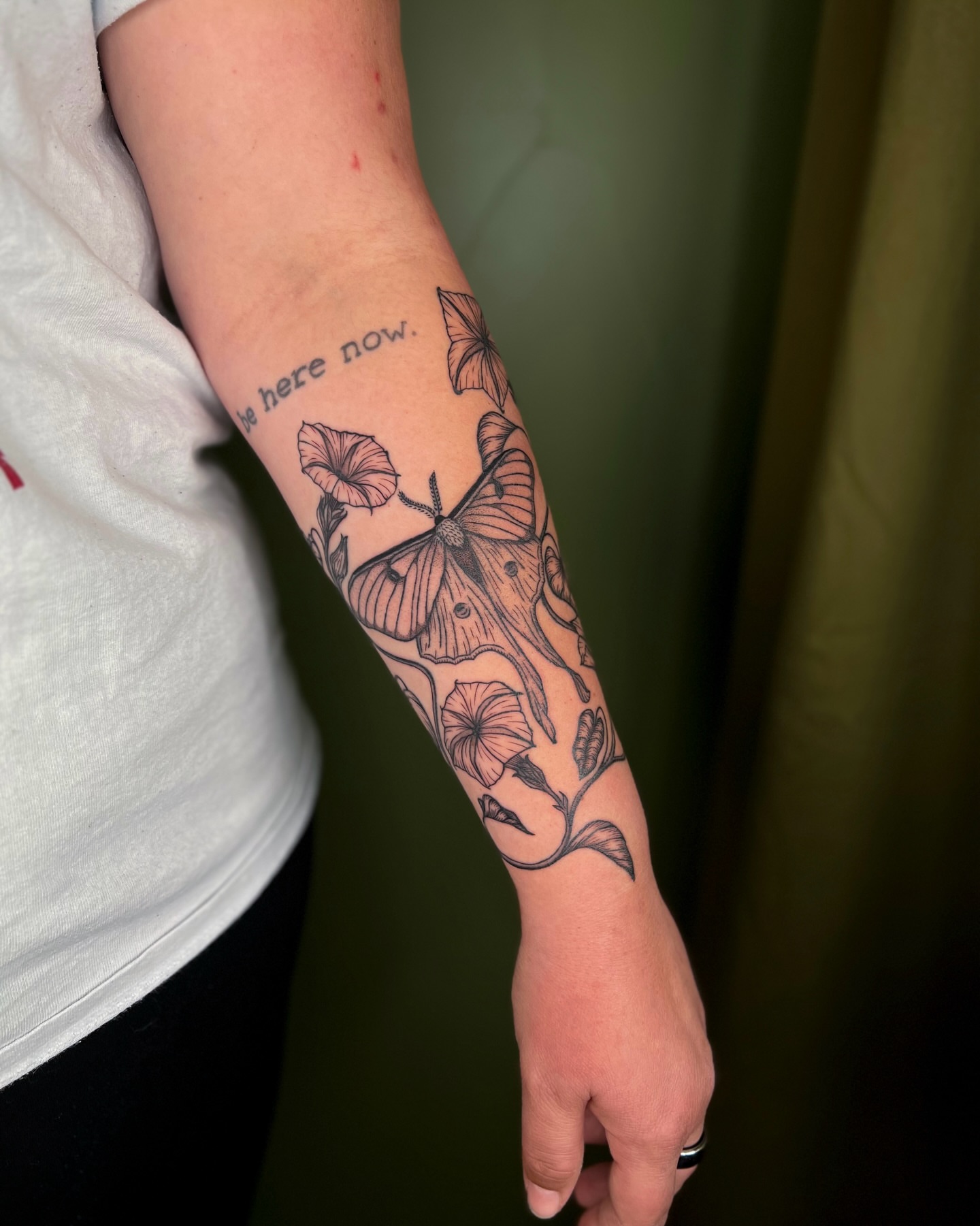 Moth and flowers black and grey tattoo on the forearm by ๐ฅ ๐๐ฅ๐๐ฑ๐ข๐ฌ ๐ฅ