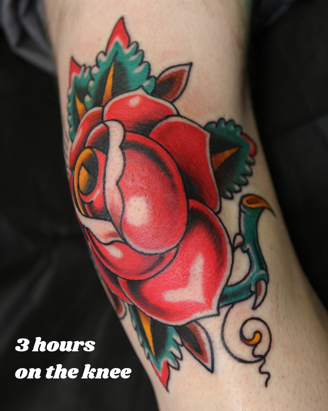 Red rose American traditional tattoo on the forearm by Chris Cockrill