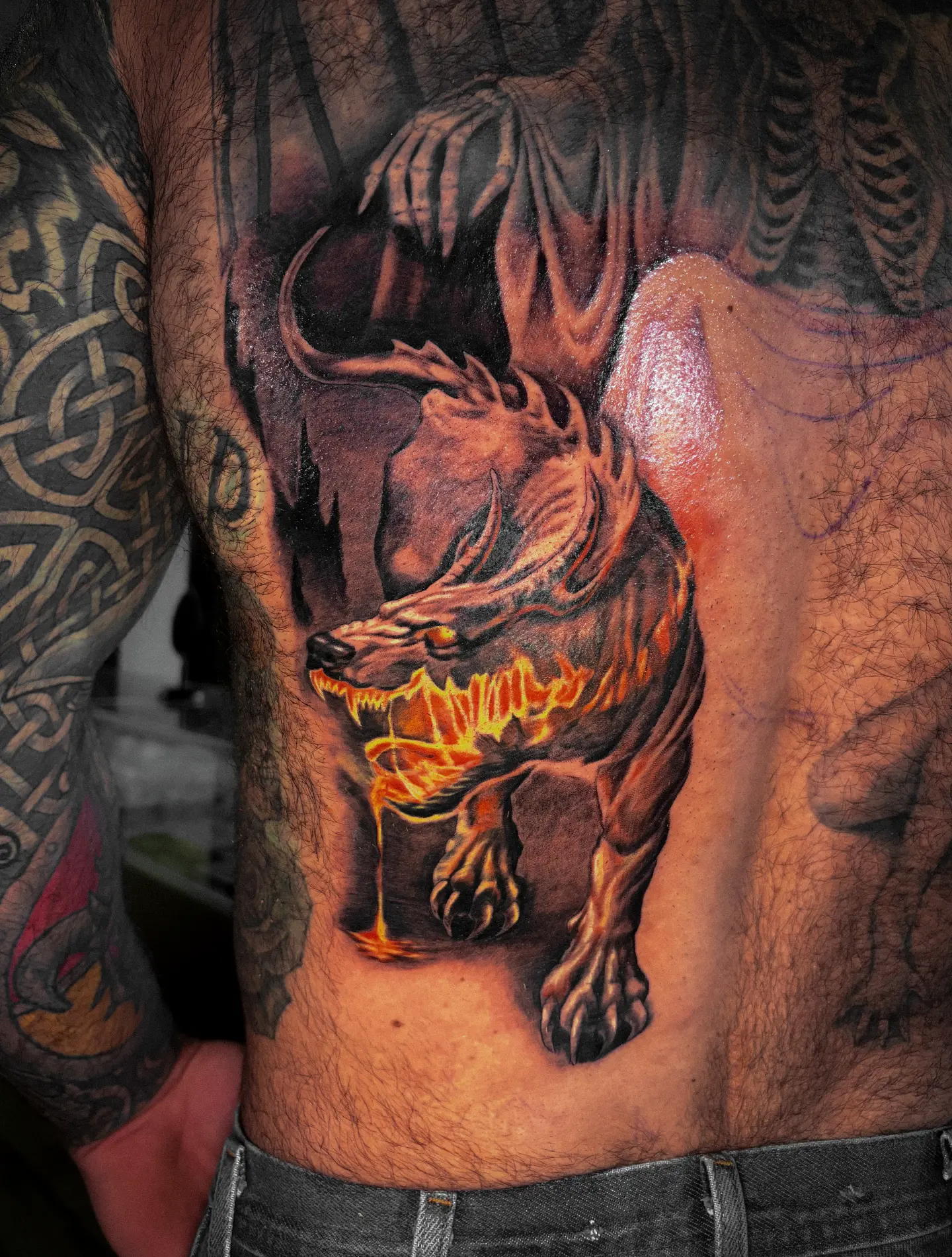 Dragon realism tattoo on the ribs by Katlyne Jones