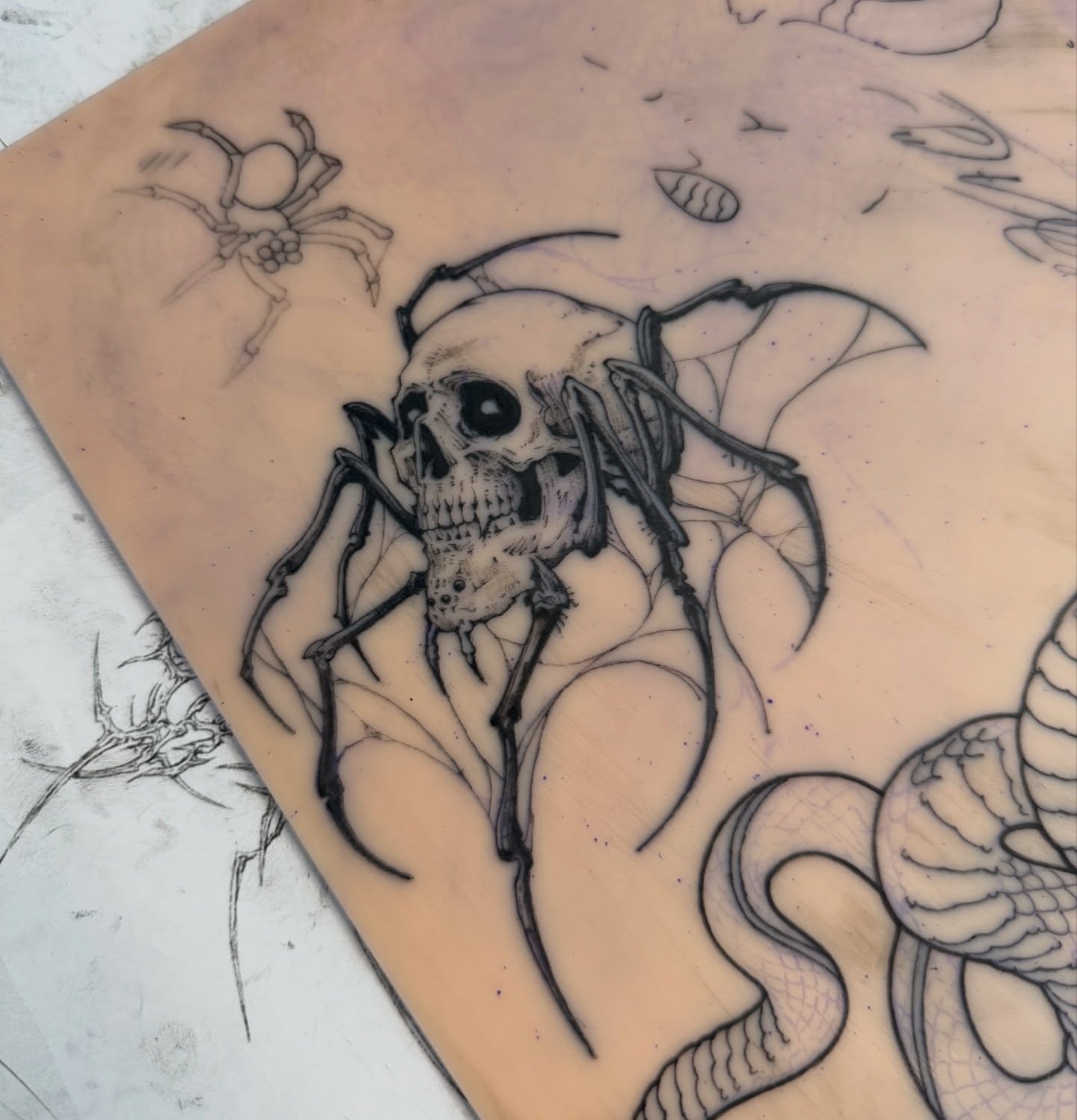 Skull and spider dark realism tattoo on the forearm by Hery Anwar