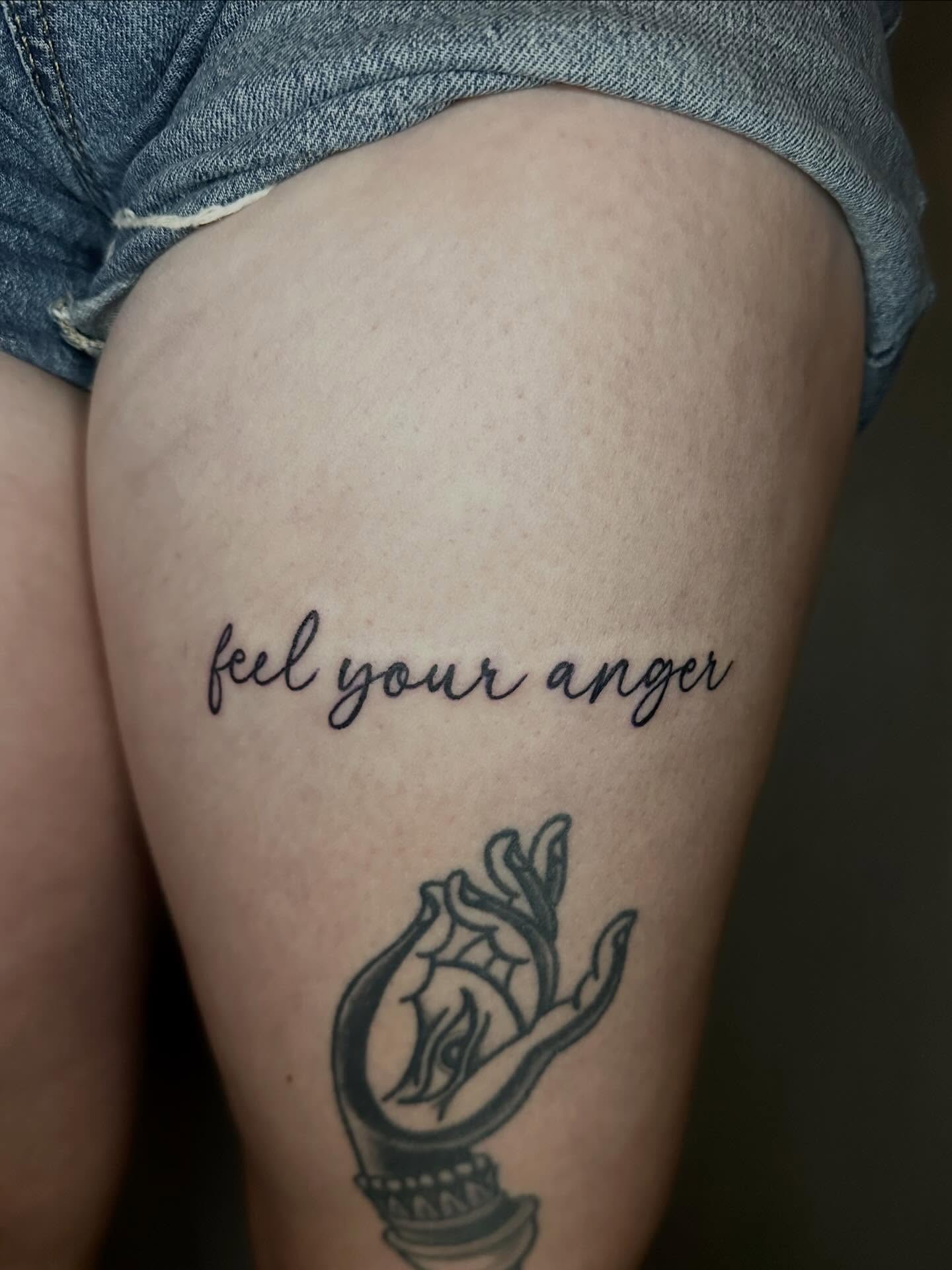 Feel your anger black and grey tattoo on the thigh by Jadelin, San Francisco, California