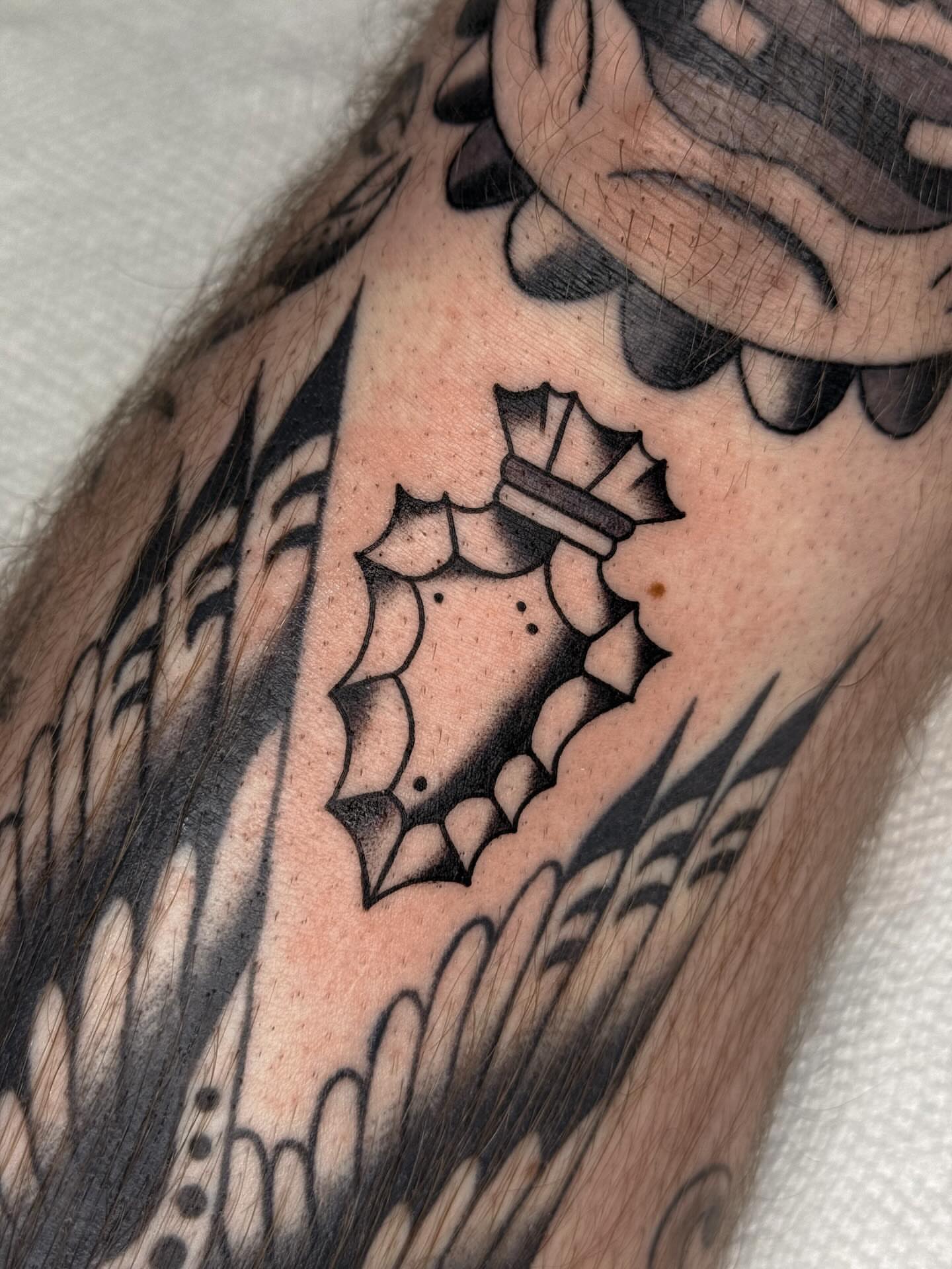 Seahorse American traditional tattoo on the forearm by Bridgette Carberry