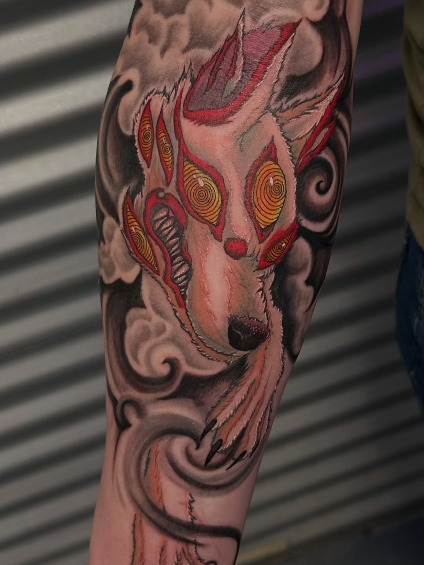 Wolf geometric tattoo on the forearm by Eugene Oregon tattoo artist